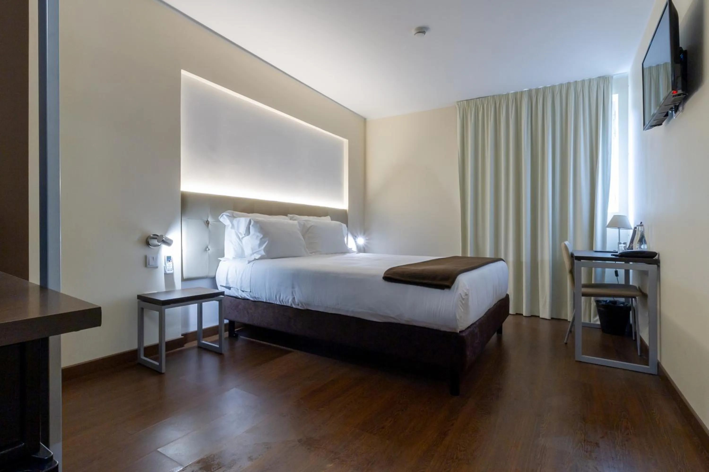 Bed in In Gold Hotel & Spa