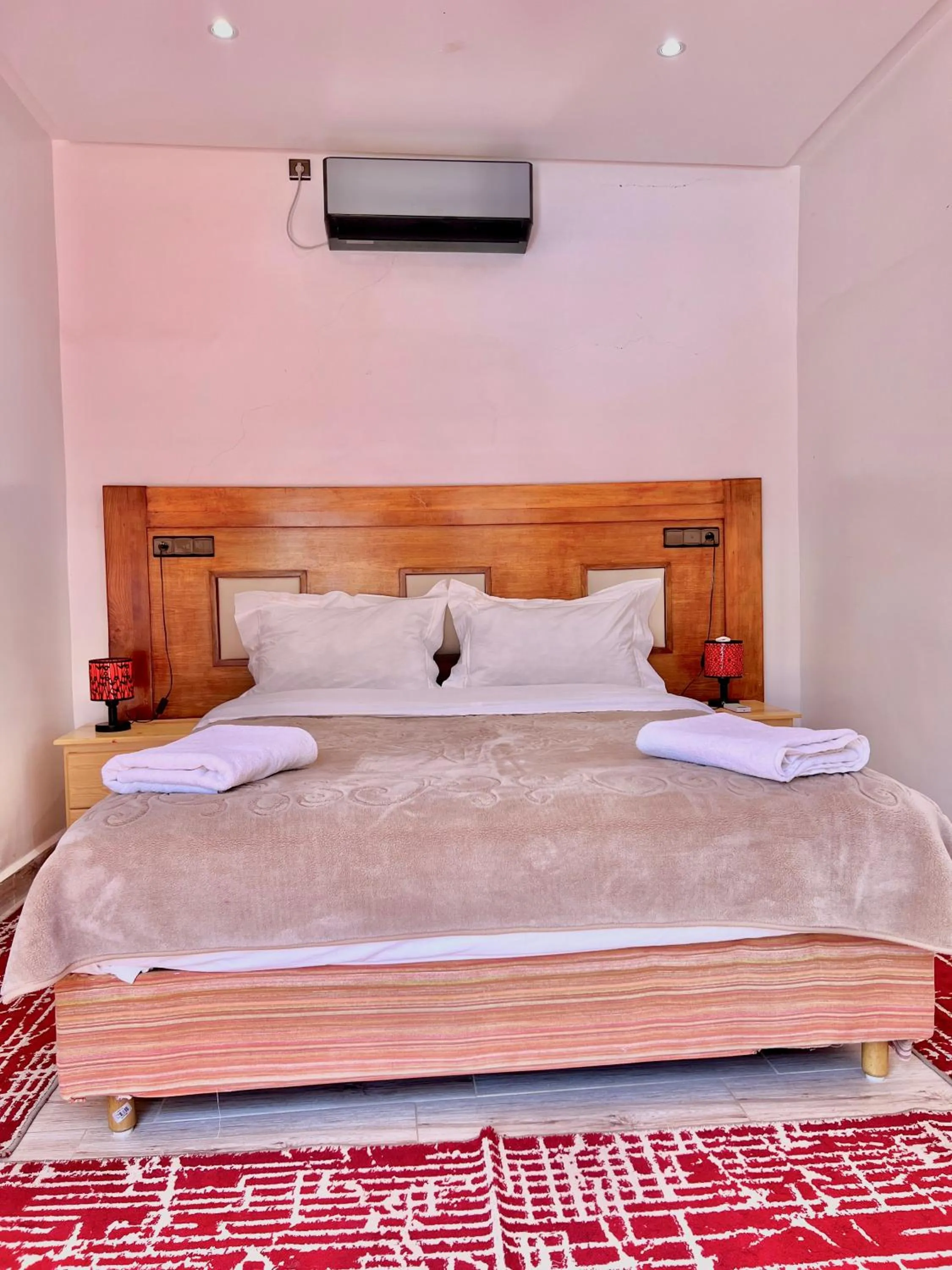 Bed in Hotel L'Arganier d'Ammelne