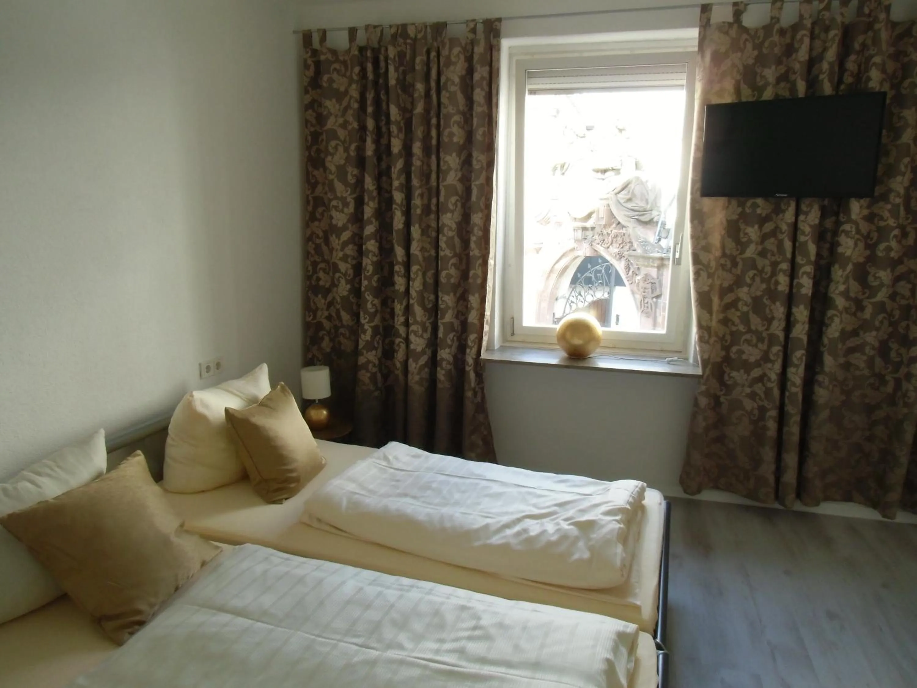 Bed in Ricks City Hotel