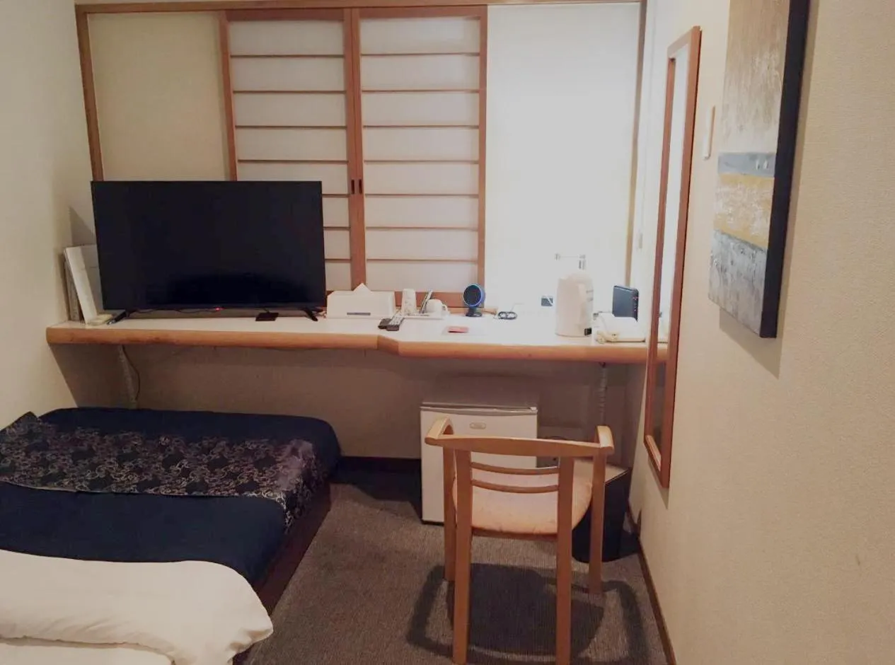 Bed in Hotel Yamachou