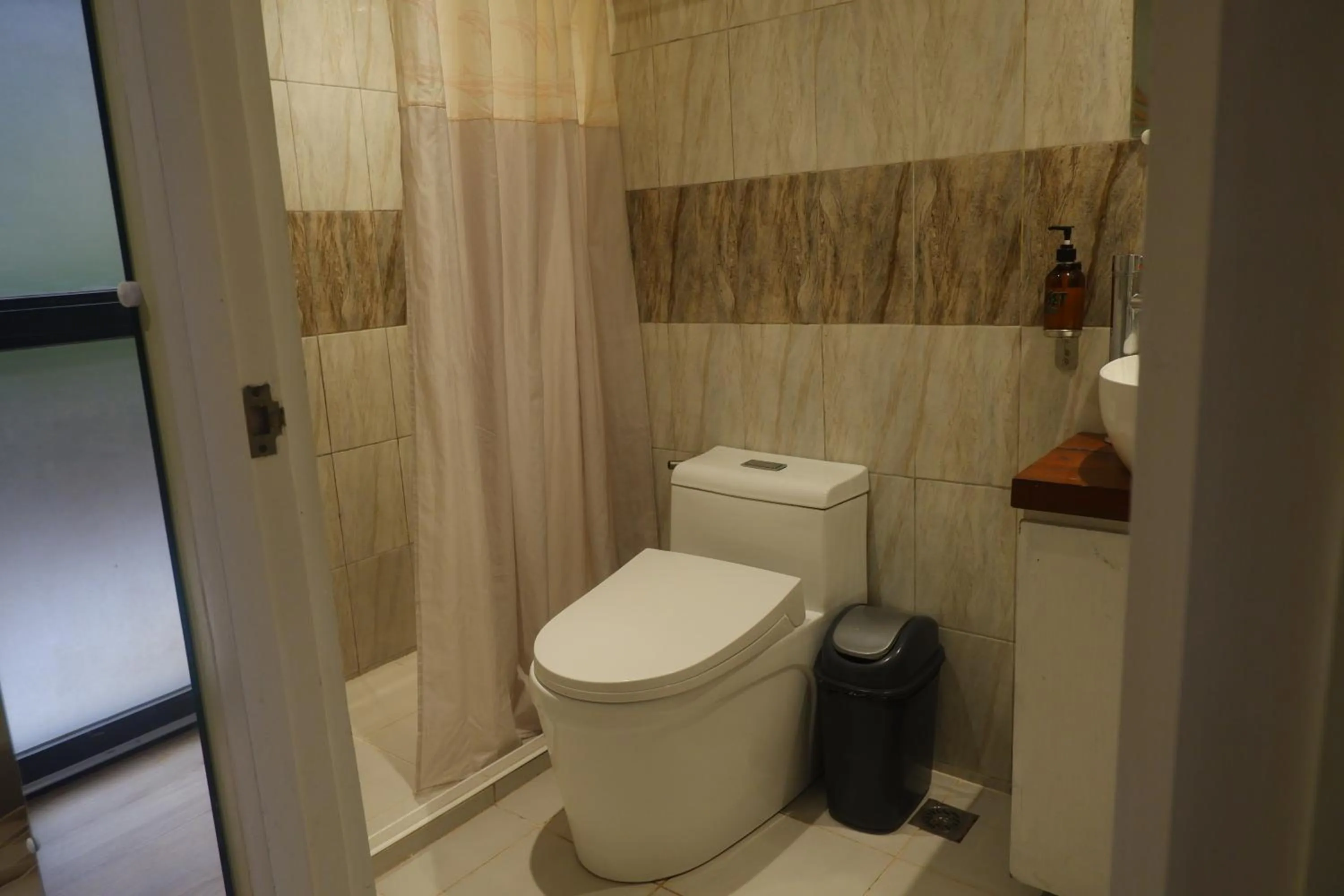 Shower in Sunset View Ridge Residences