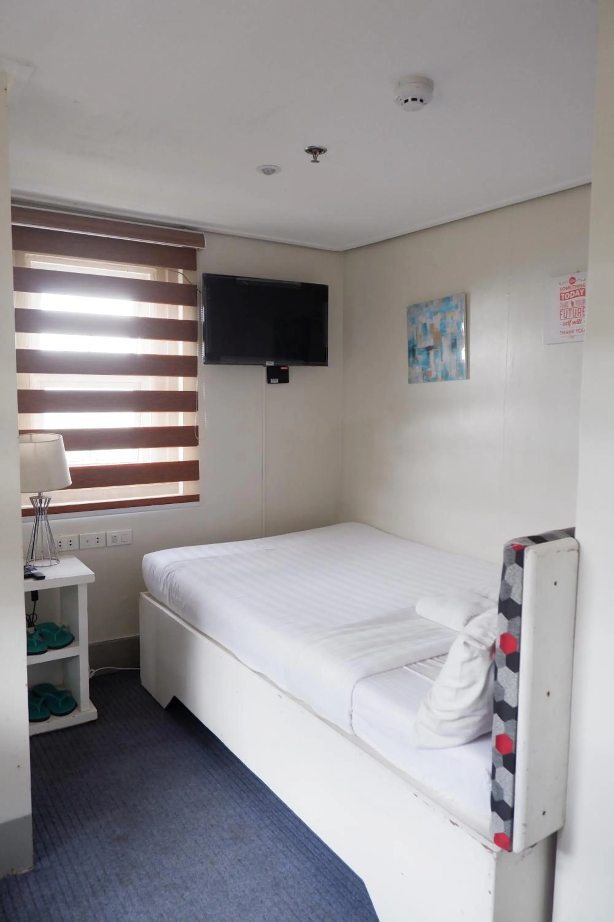 Bed in Sunset View Ridge Residences