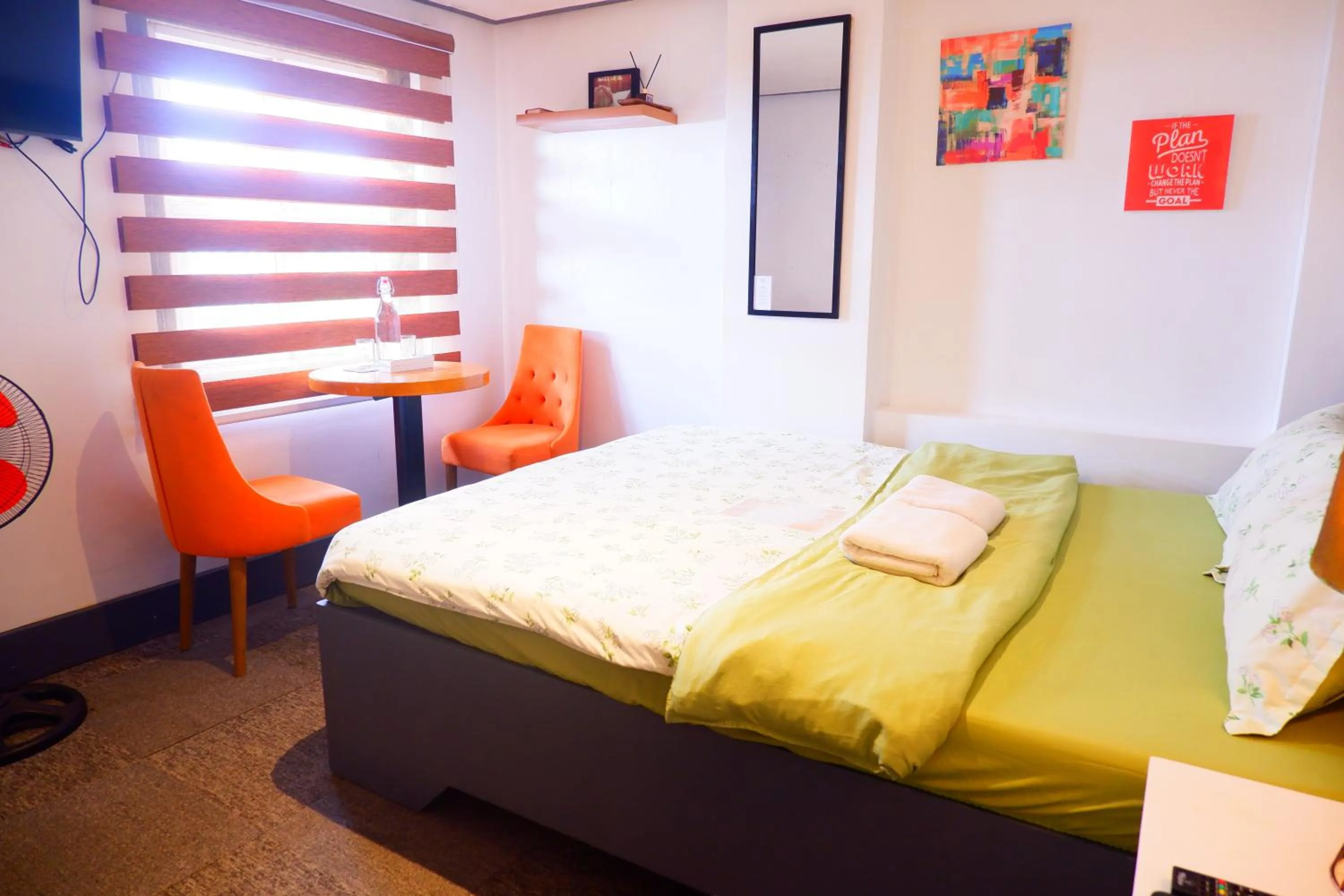 Bed in Sunset View Ridge Residences