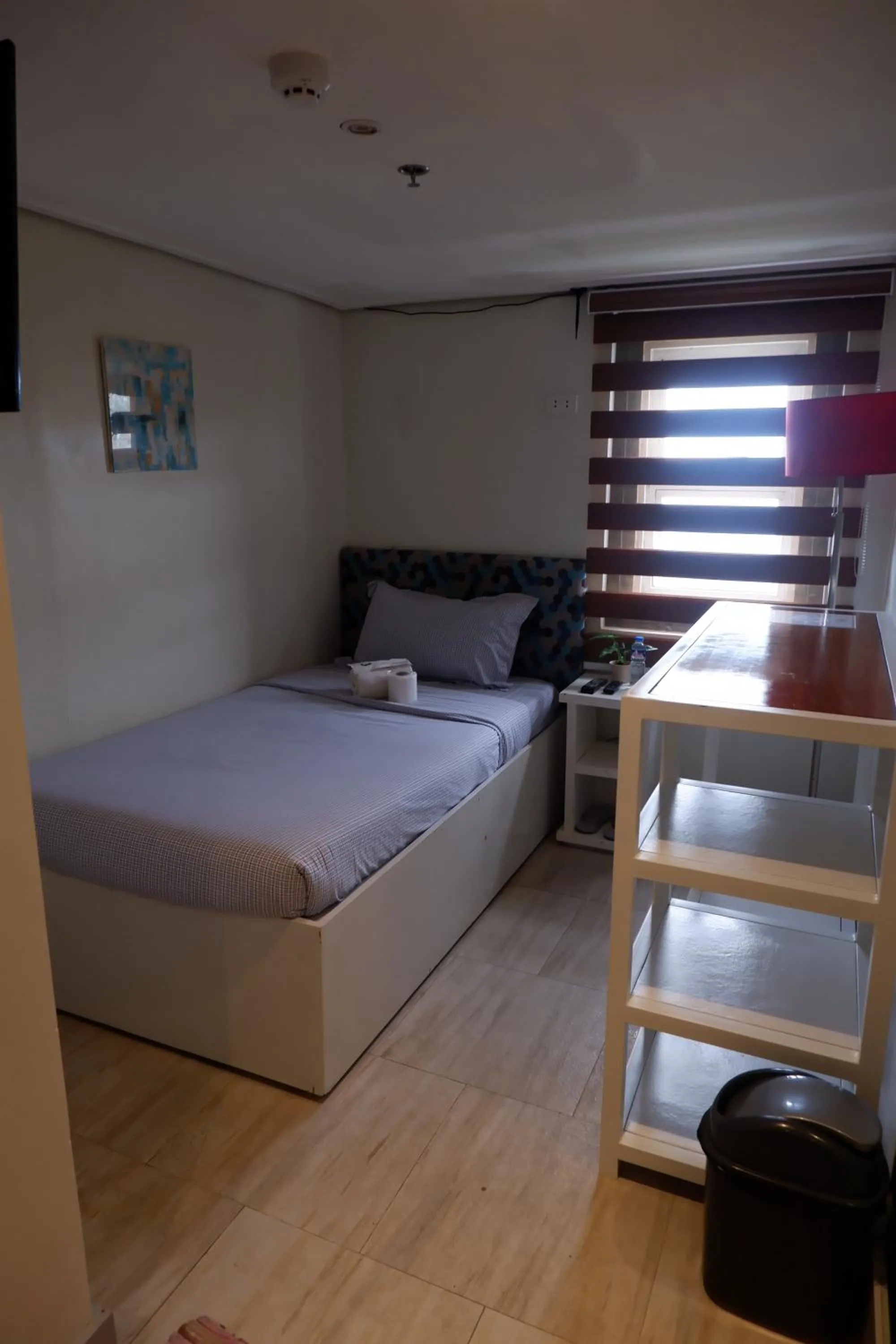 Bed in Sunset View Ridge Residences