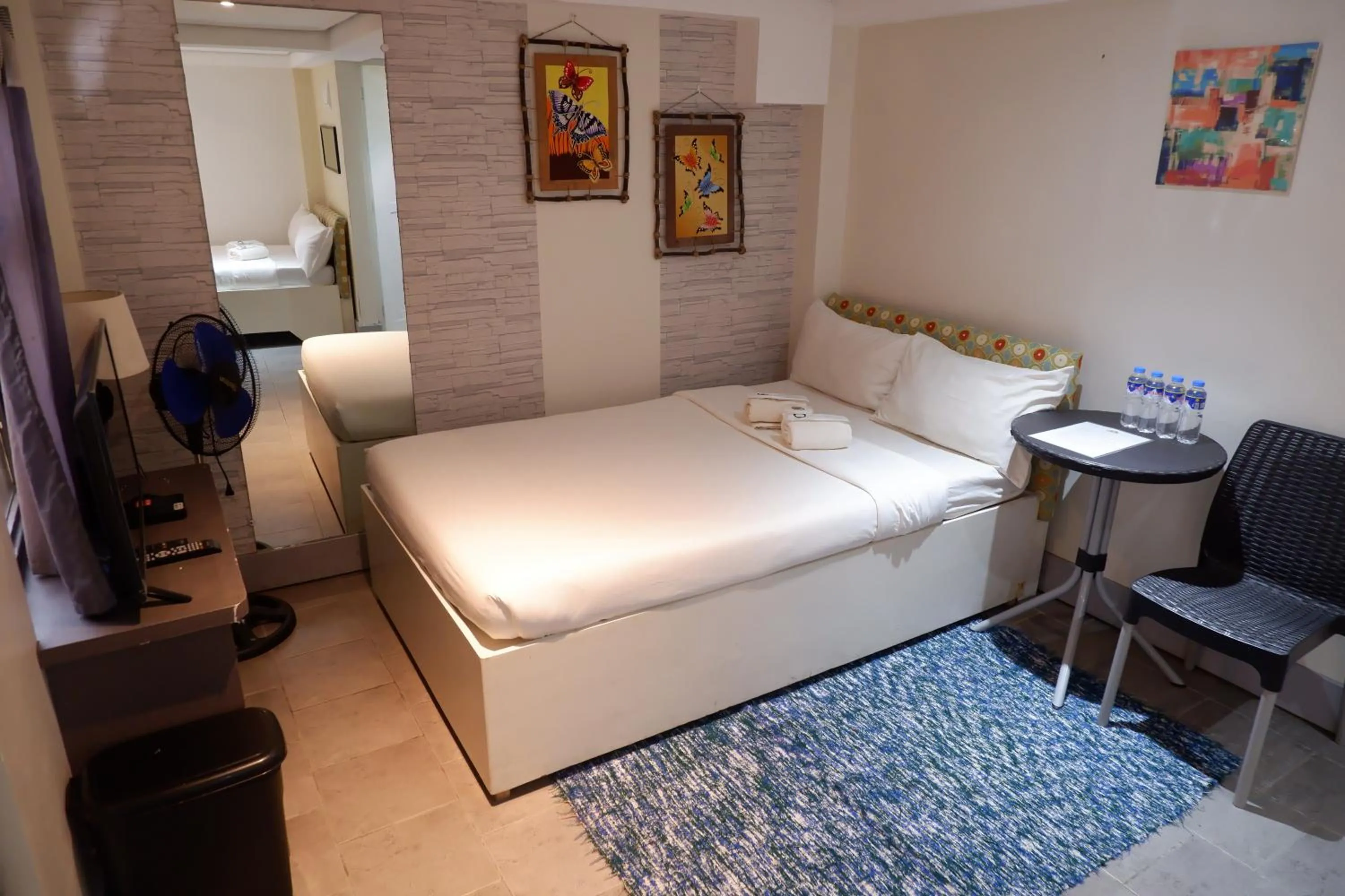 Bed in Sunset View Ridge Residences