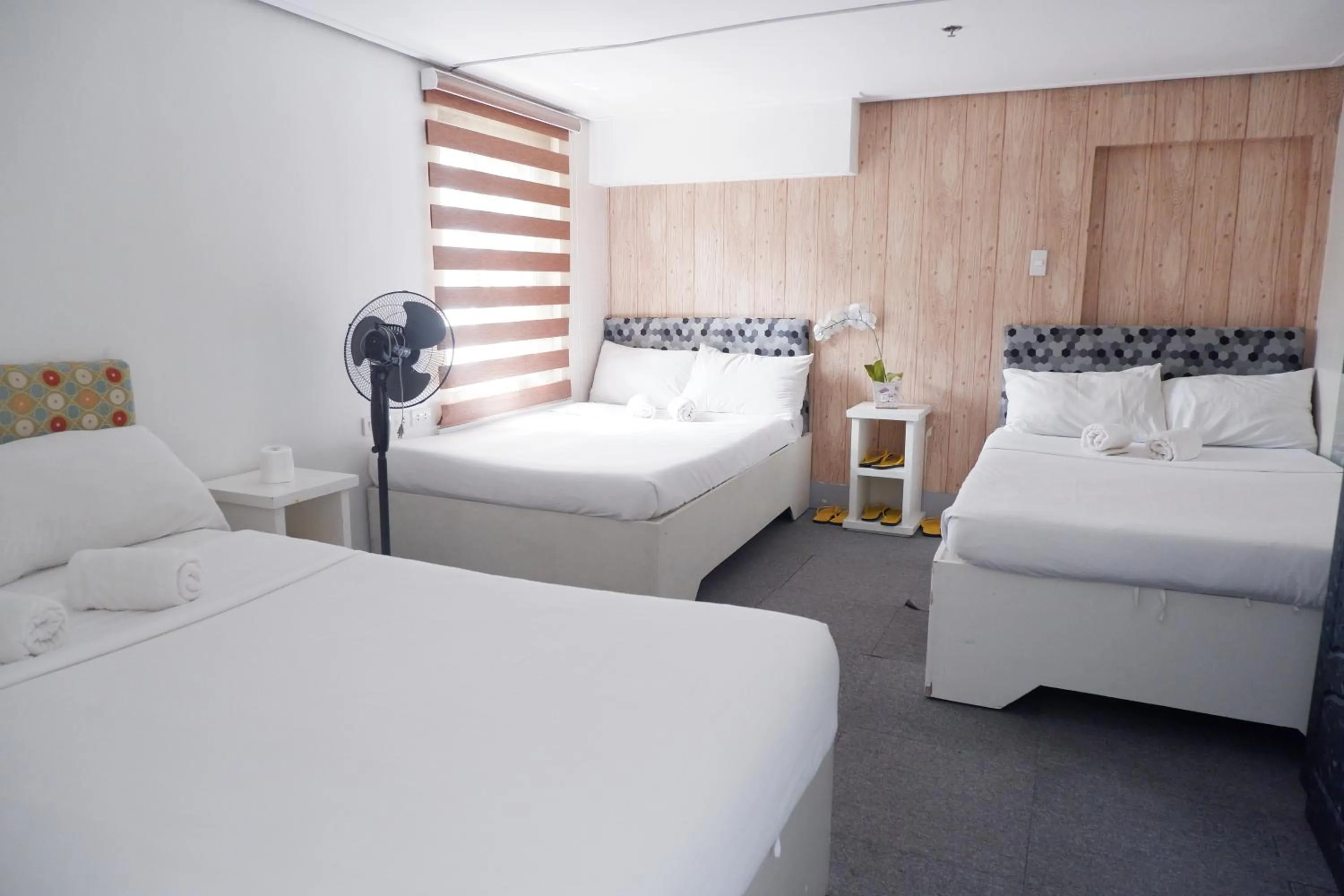 Bed in Sunset View Ridge Residences