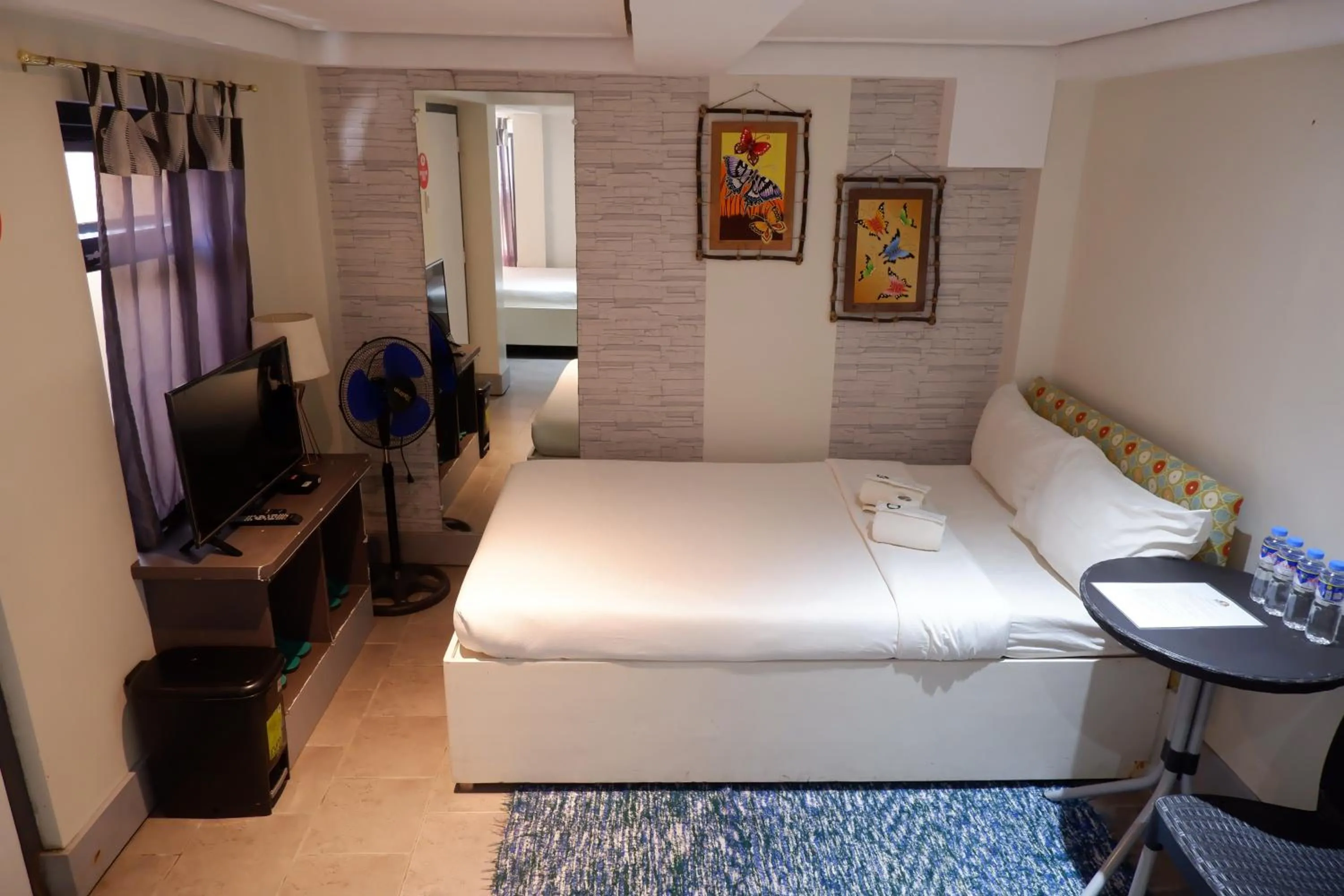 Bed in Sunset View Ridge Residences