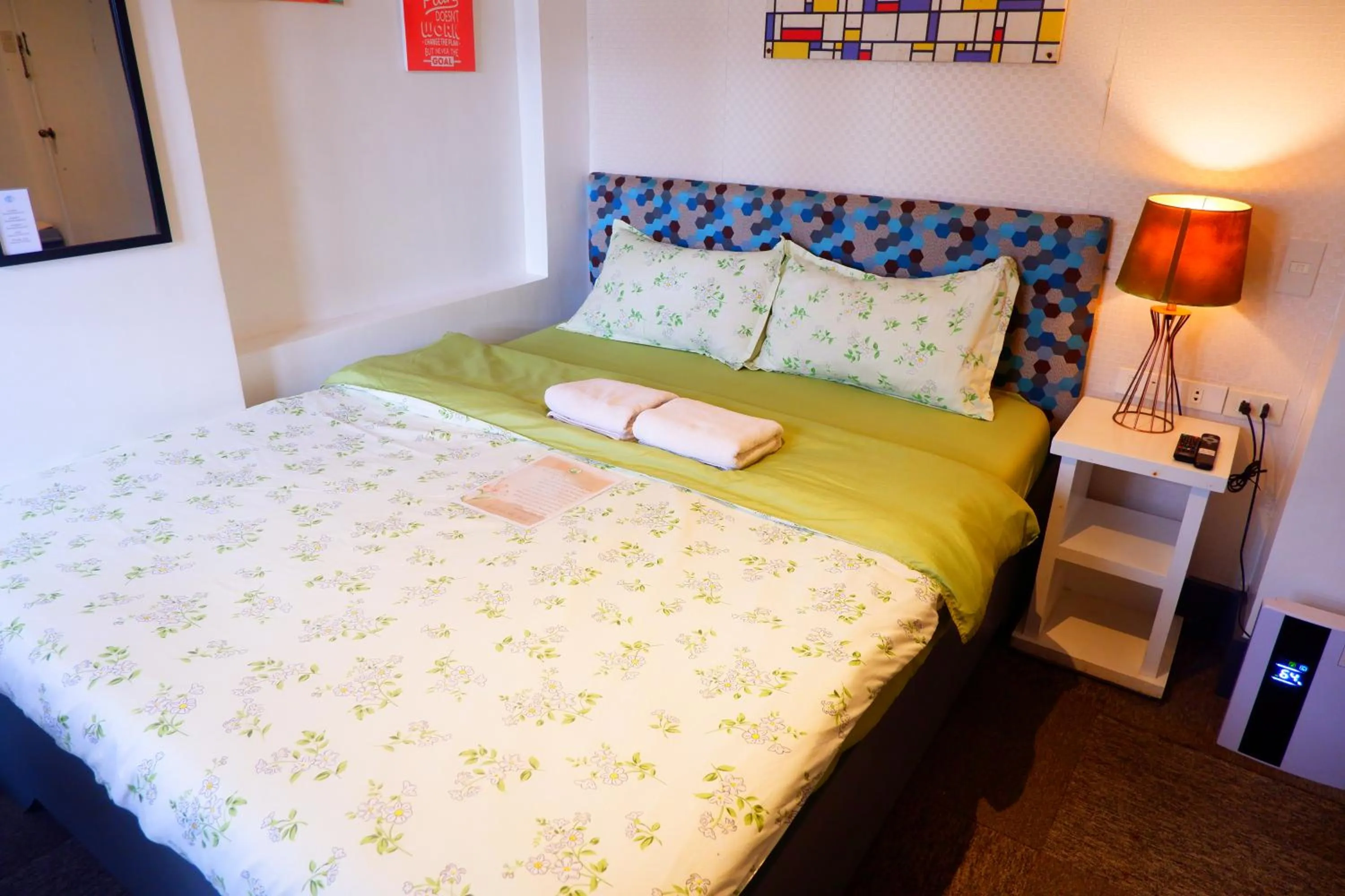 Bed in Sunset View Ridge Residences