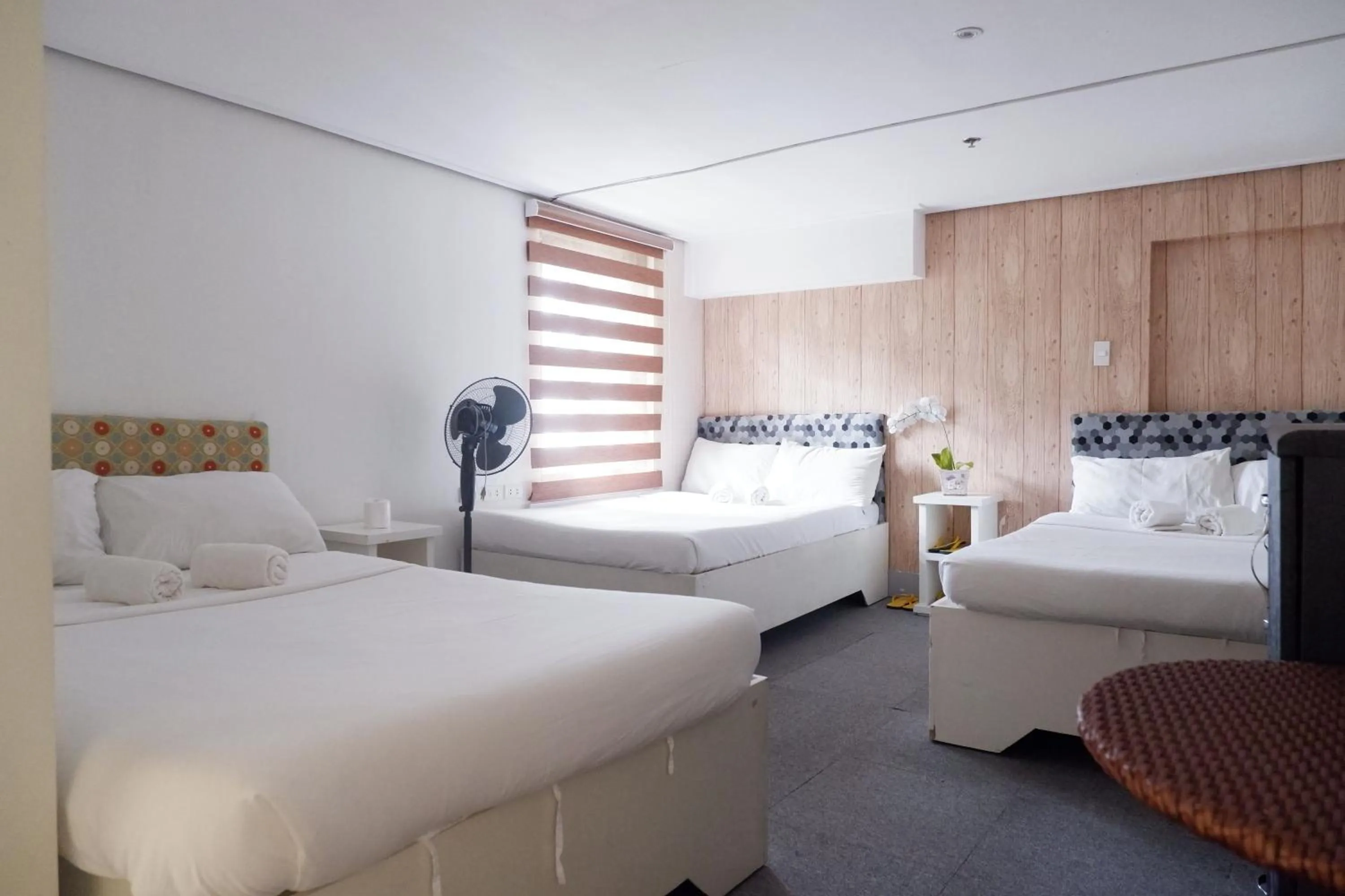 Bed in Sunset View Ridge Residences