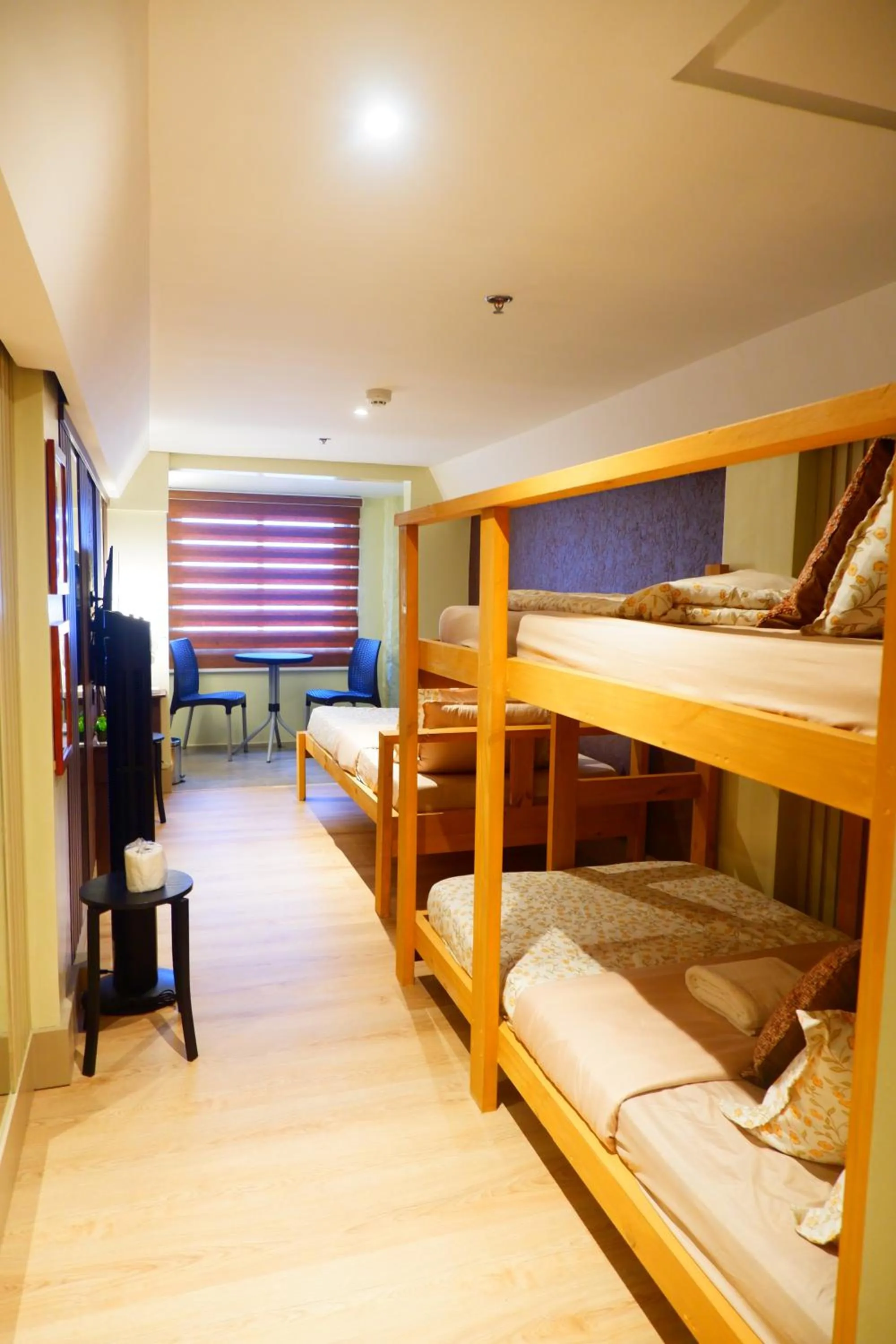 Bed in Sunset View Ridge Residences