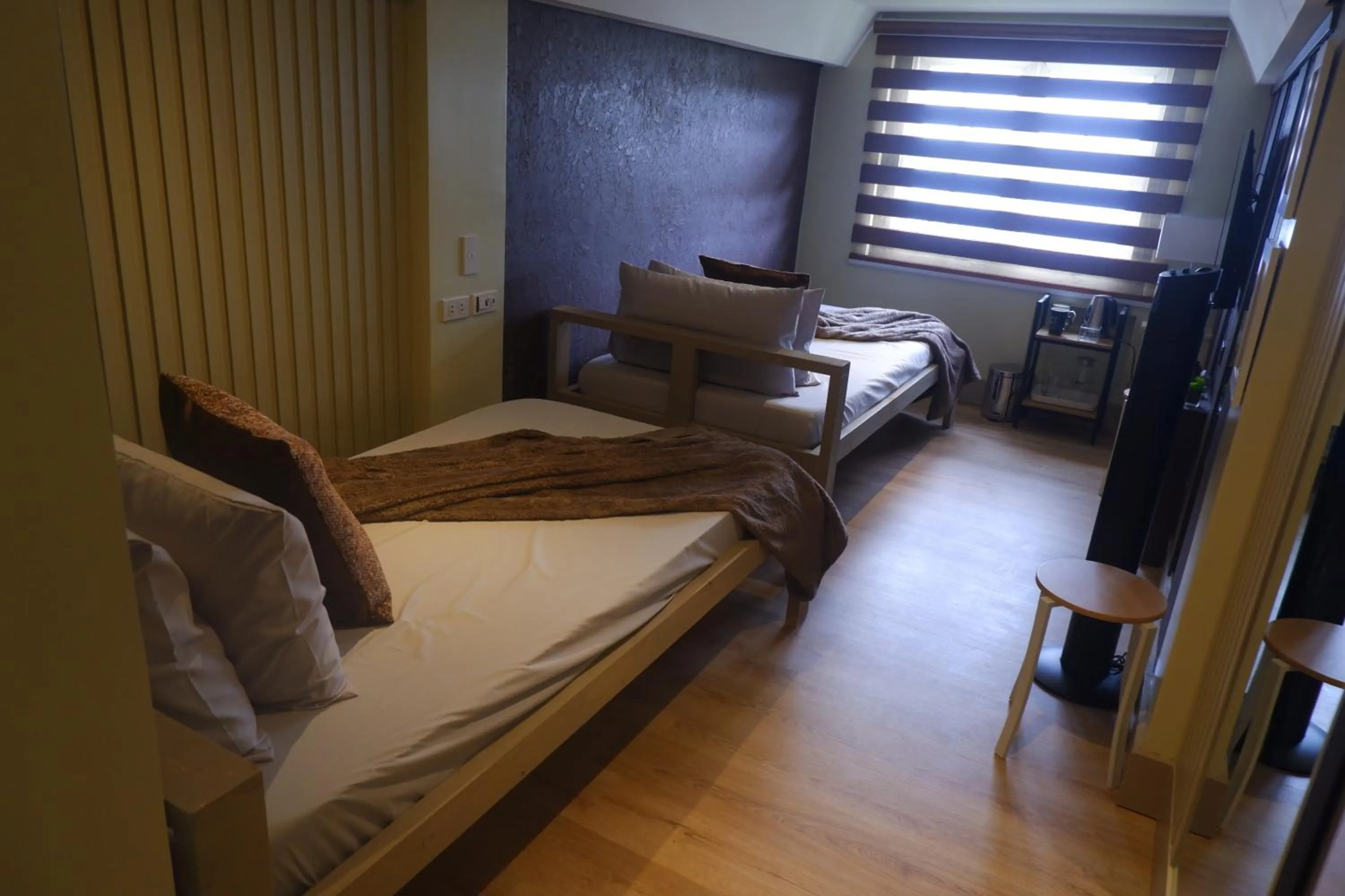 Bed in Sunset View Ridge Residences