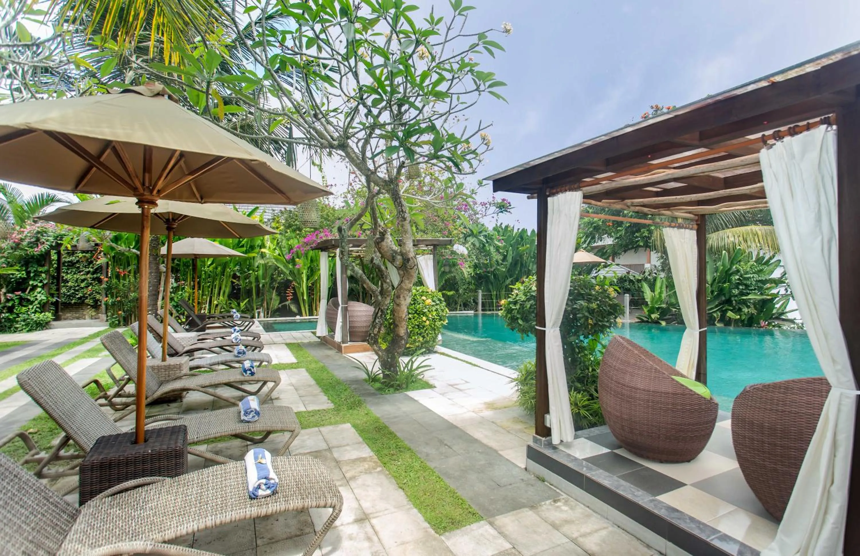 Swimming pool in Manah Shanti Suites by GenuineHost