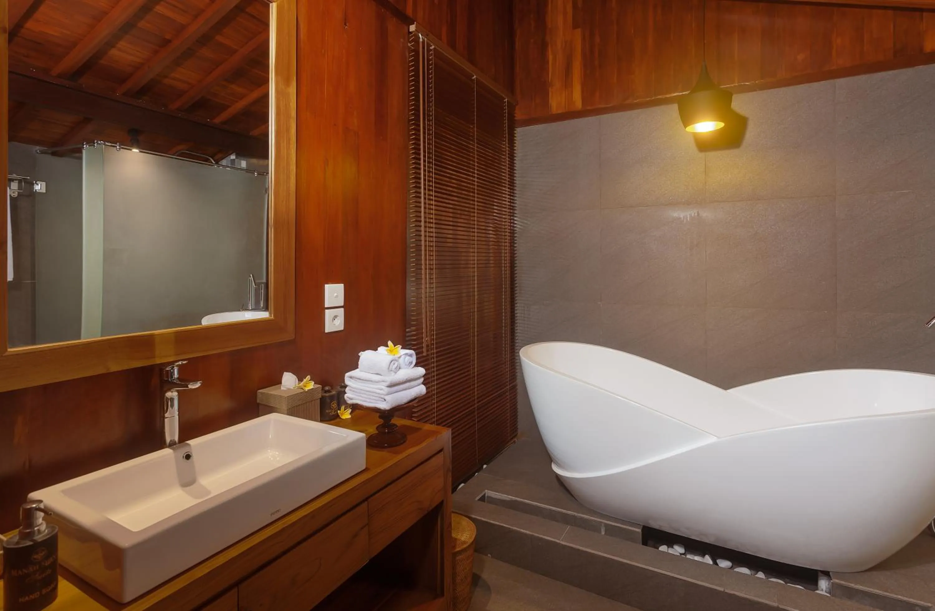 Bathroom in Manah Shanti Suites by GenuineHost