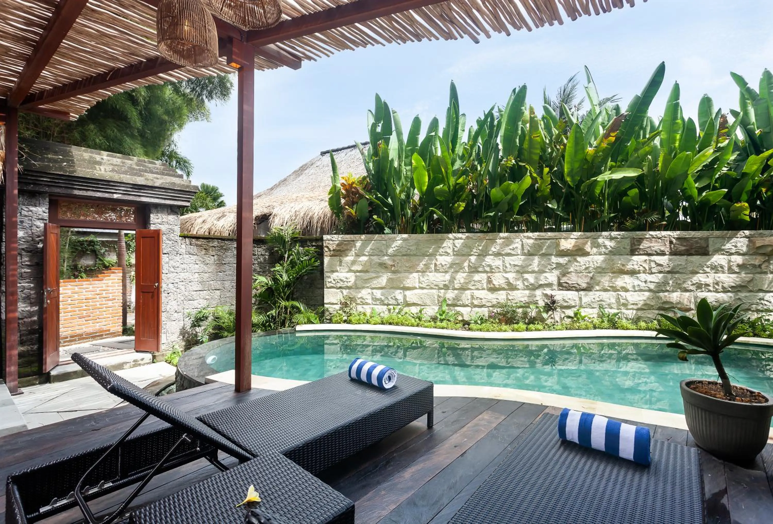 Swimming pool in Manah Shanti Suites by GenuineHost