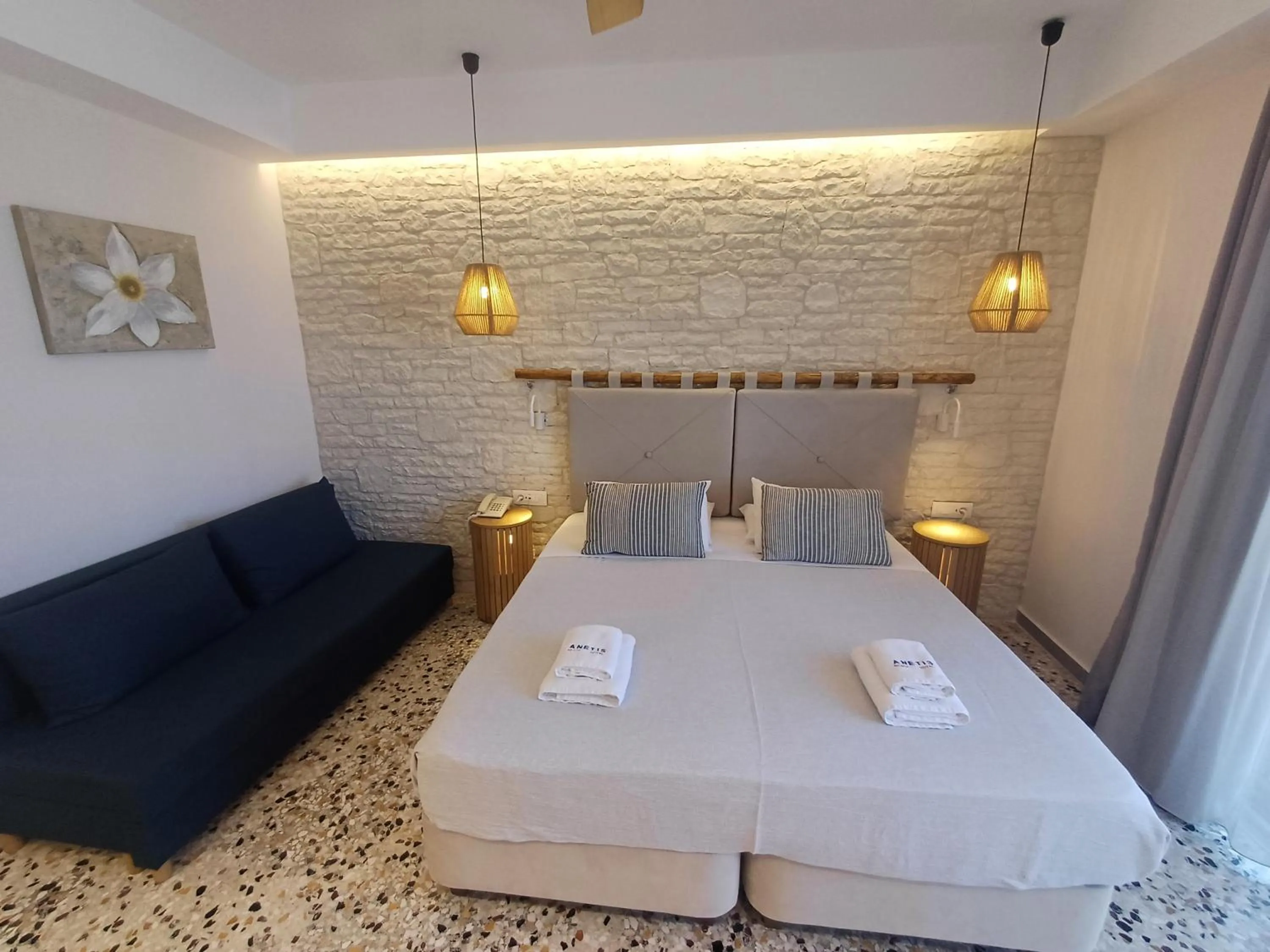 Bed in Anetis Beach Hotel