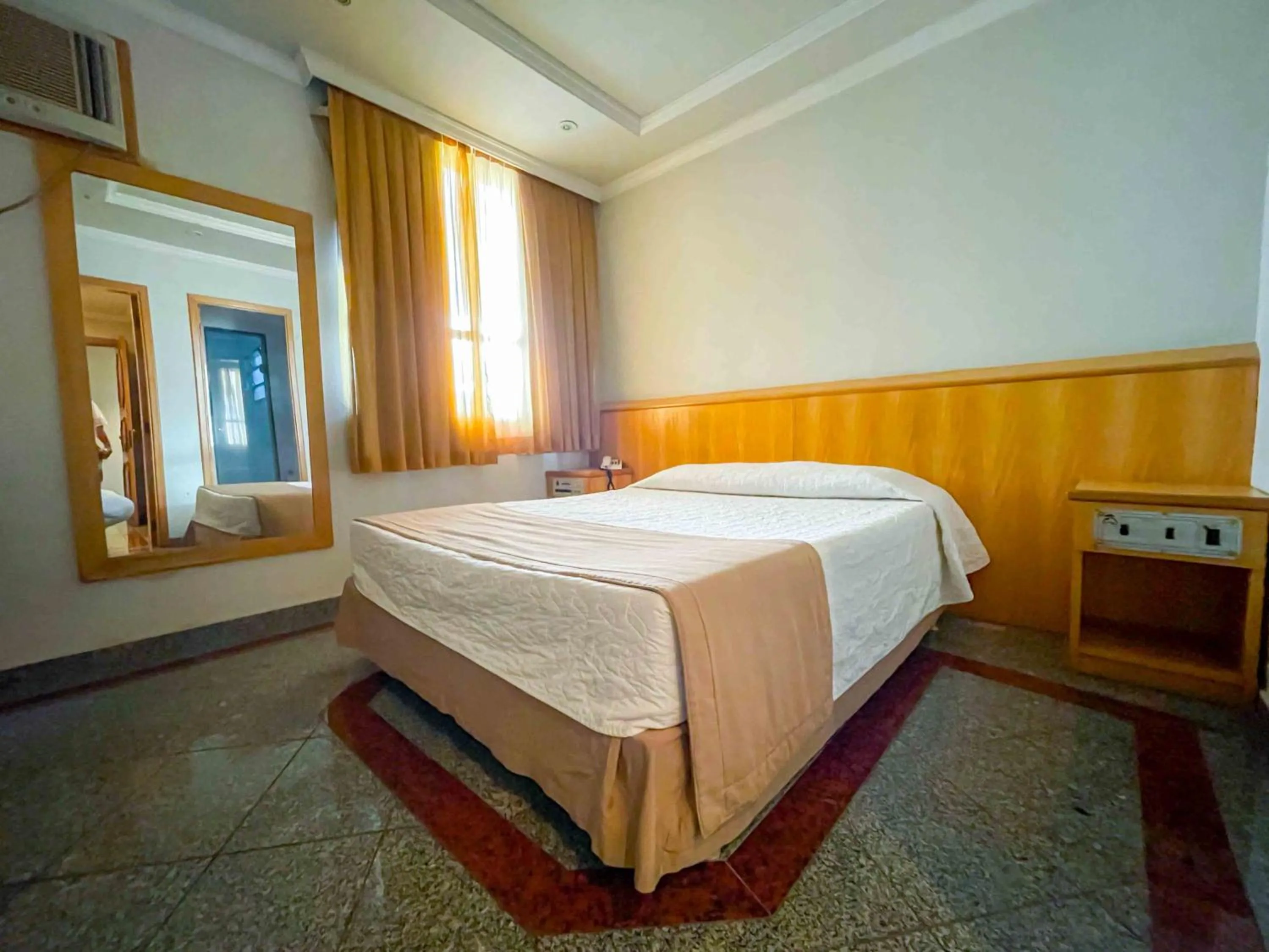 Bed in Saionara Hotel