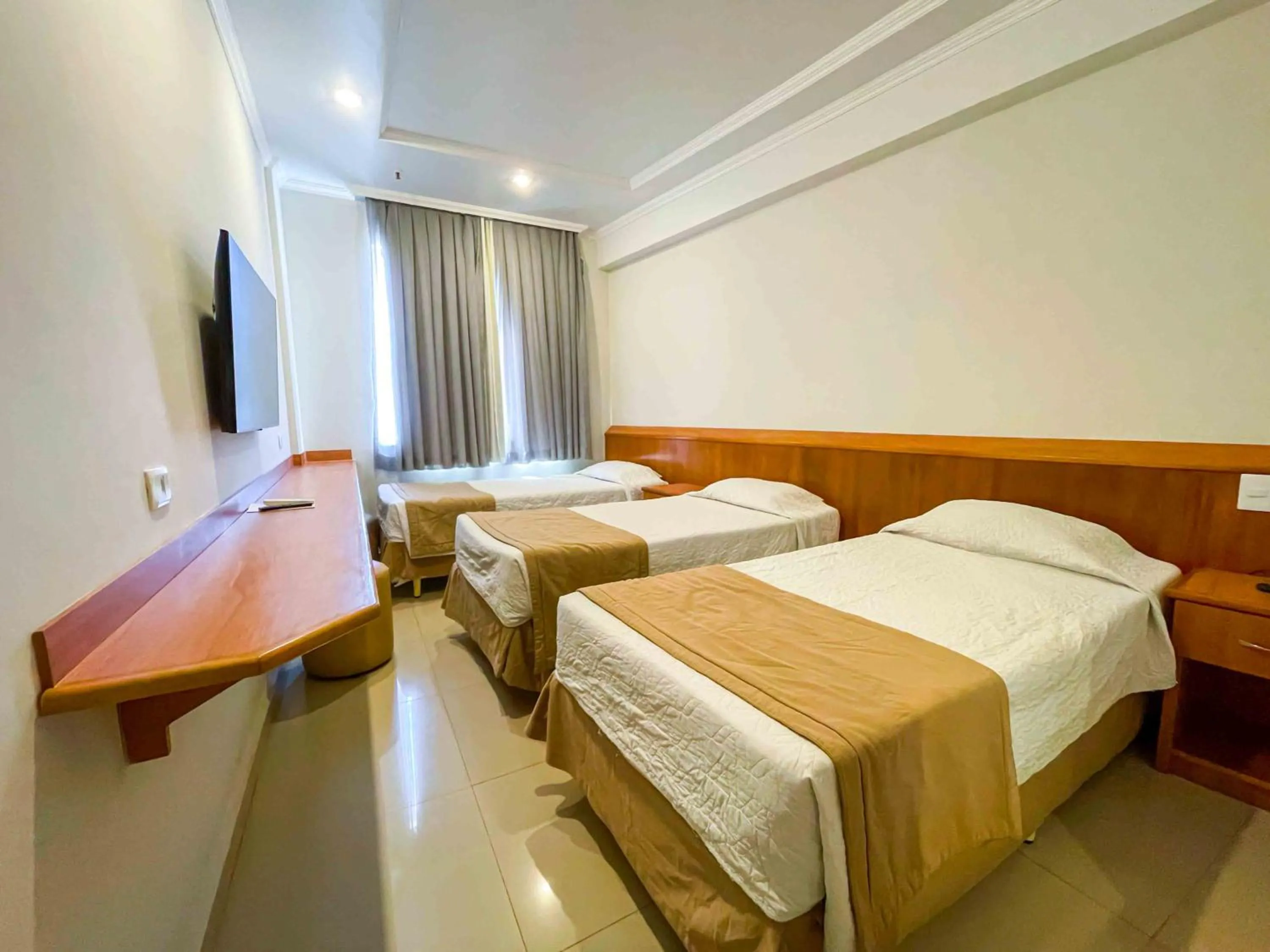 Bed in Saionara Hotel