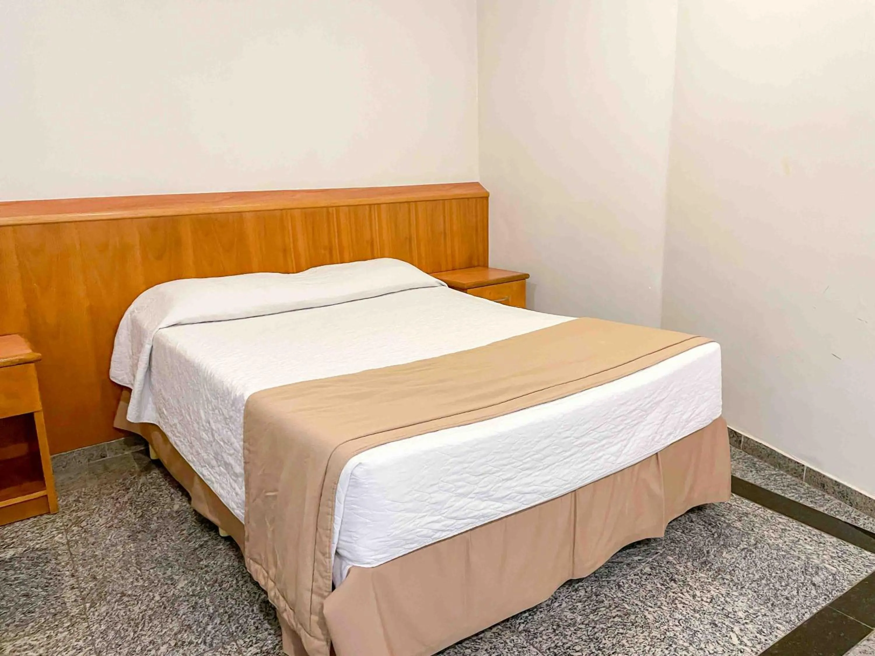 Bed in Saionara Hotel