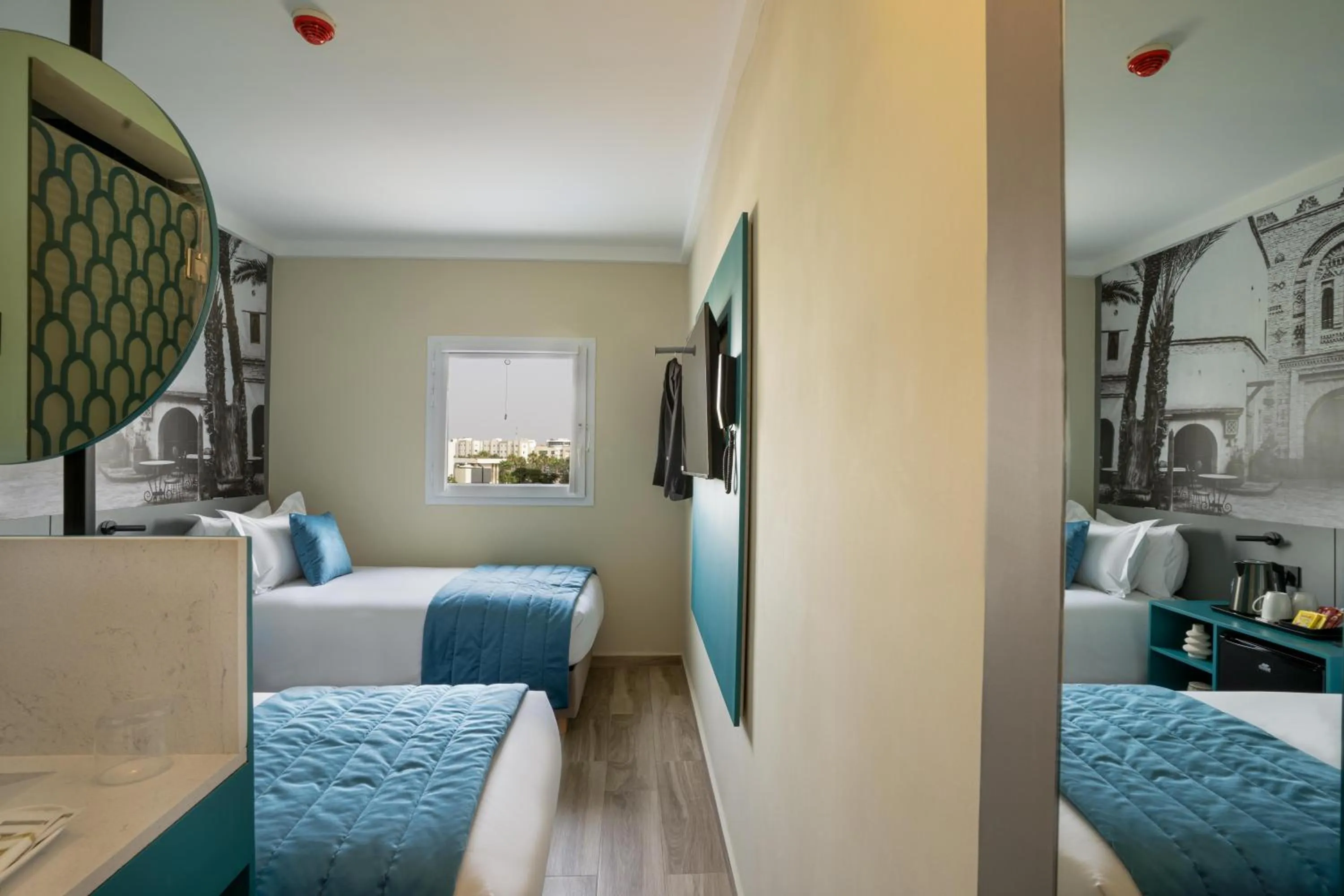 Photo of the whole room, Bed in MIA Urban Agadir