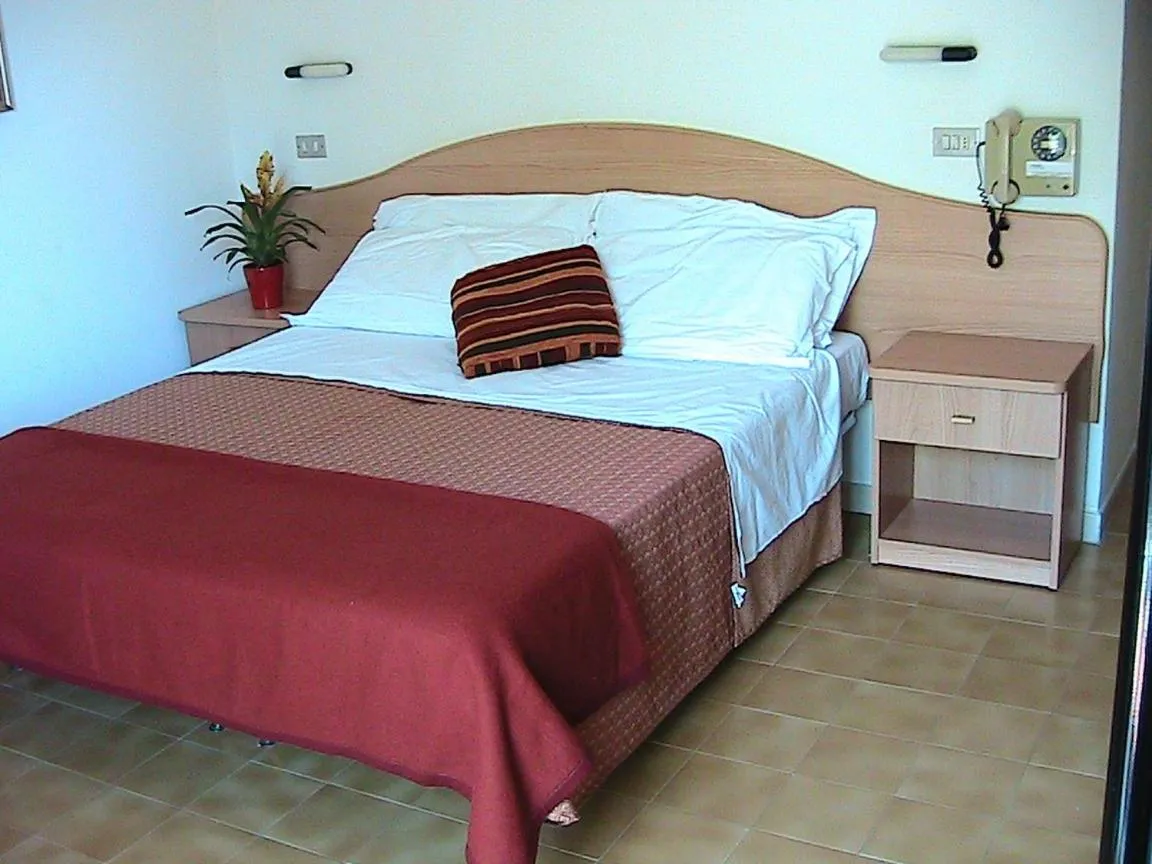 Bed in Hotel Universo