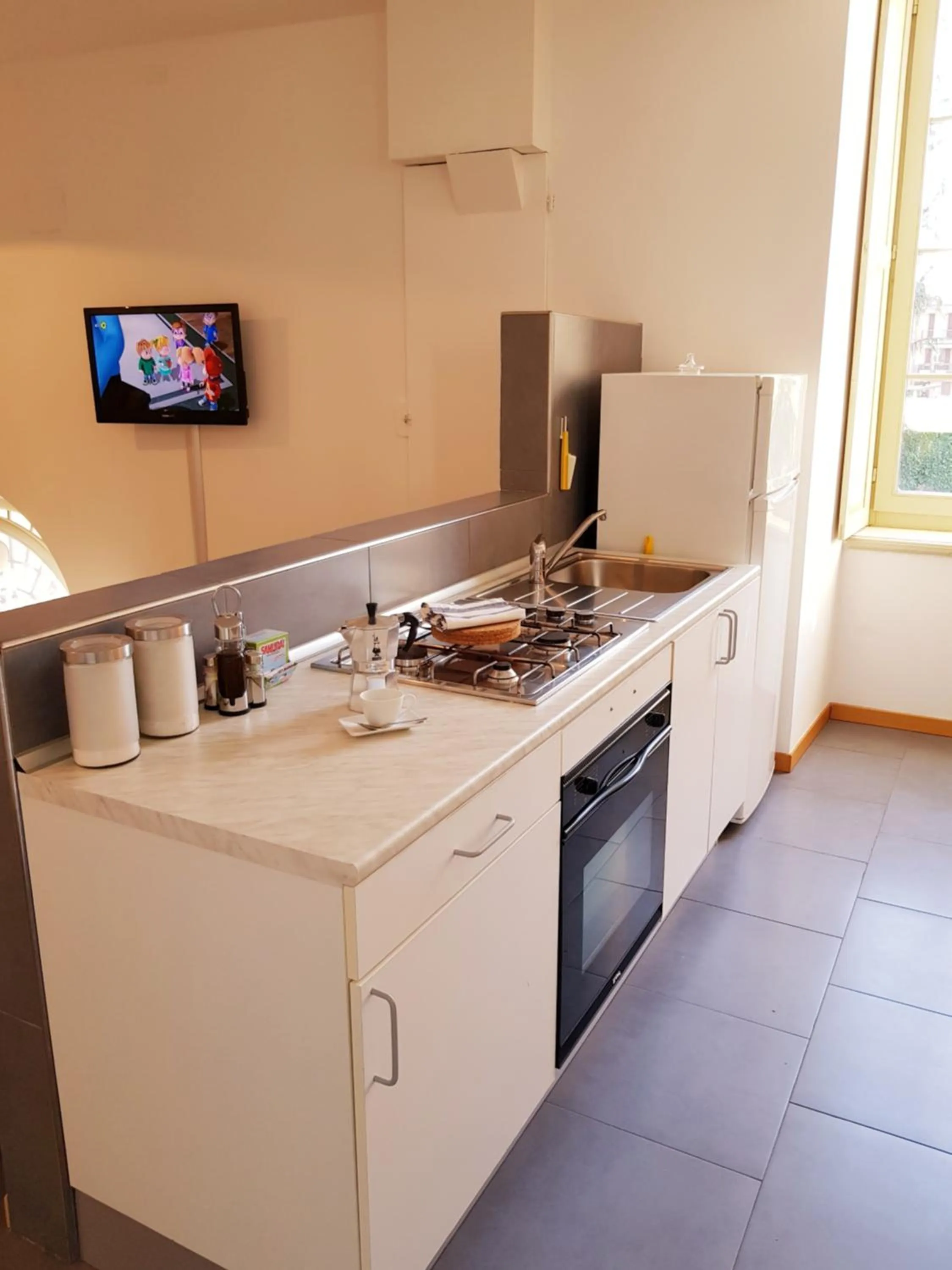 Kitchen or kitchenette in CharmeRooms Villa Moroni
