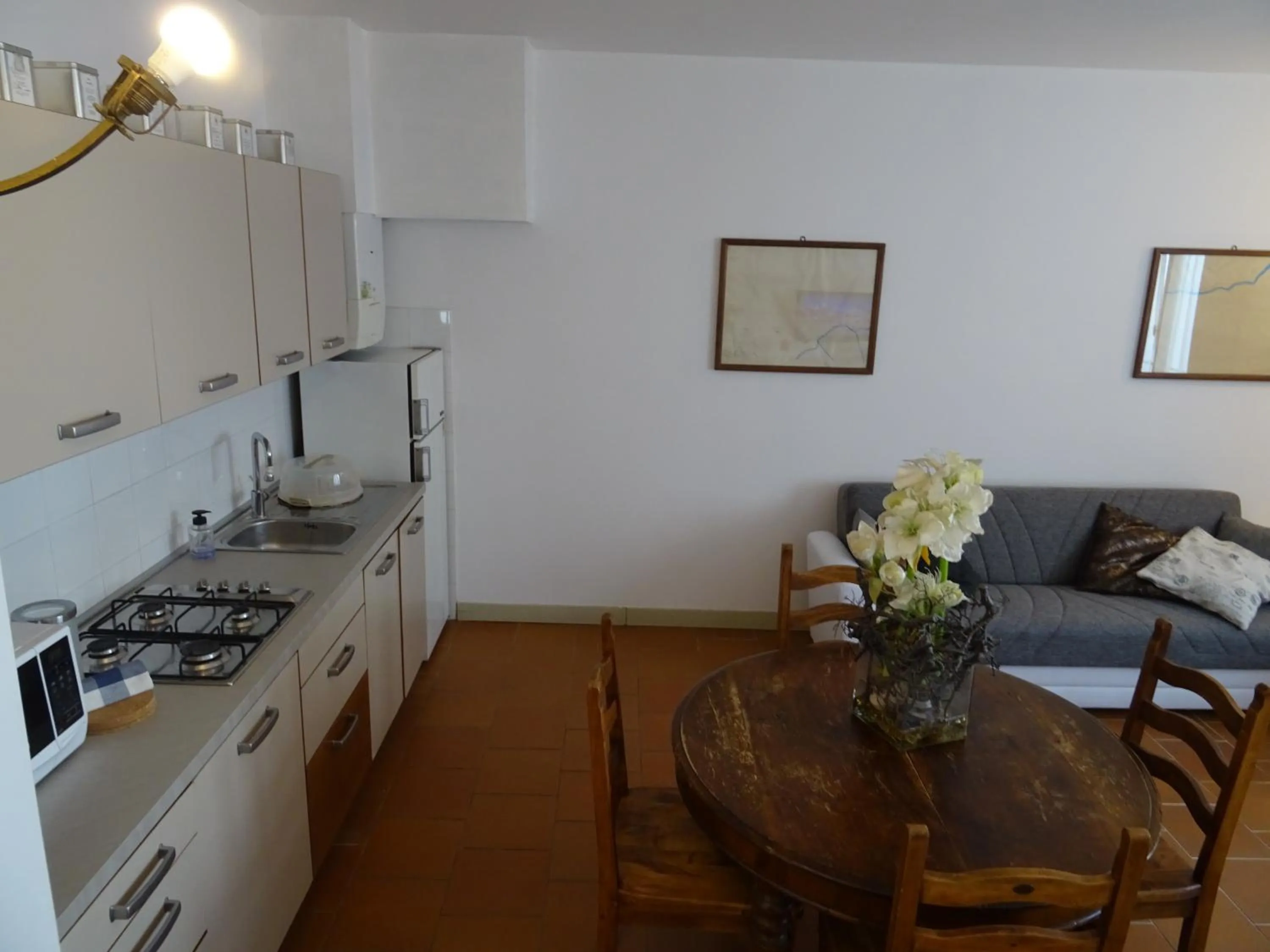 Kitchen or kitchenette in CharmeRooms Villa Moroni