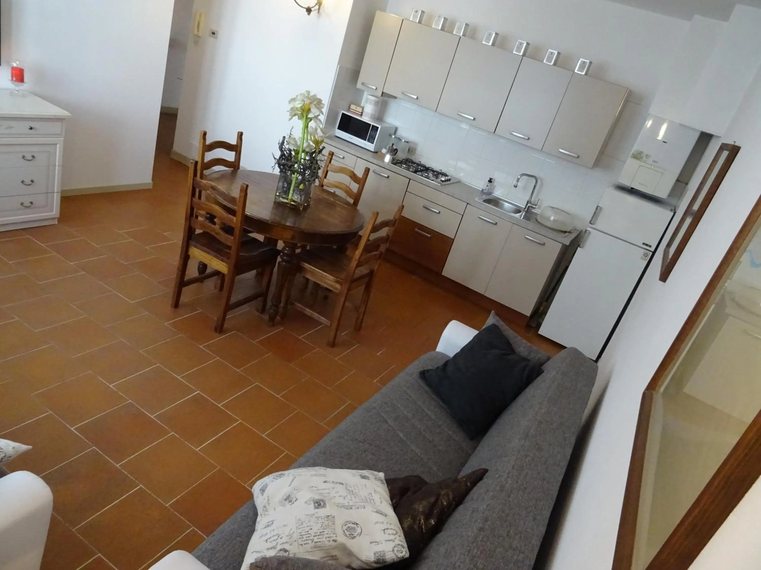 Kitchen or kitchenette in CharmeRooms Villa Moroni