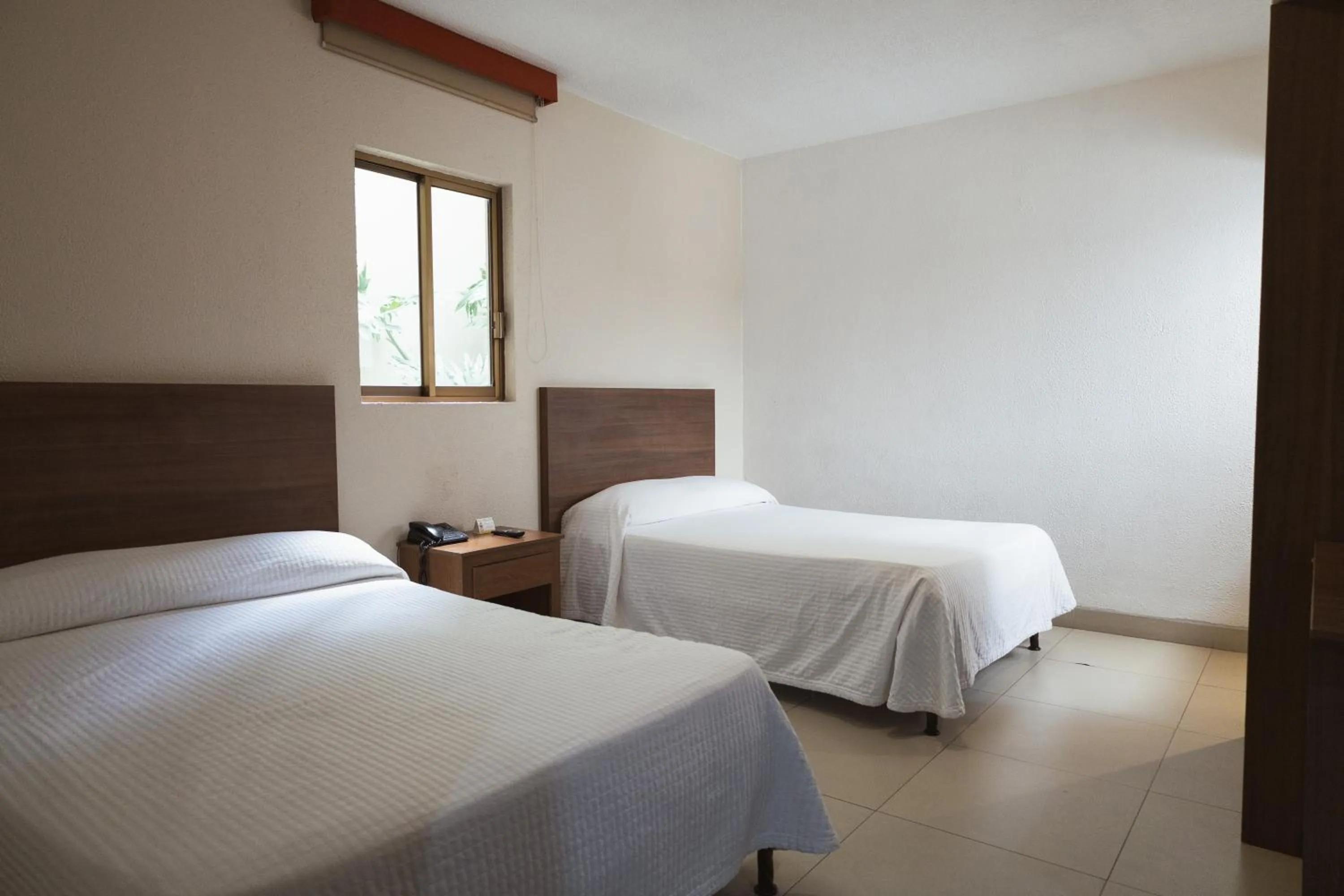 Bed in Hotel Posada Virreyes