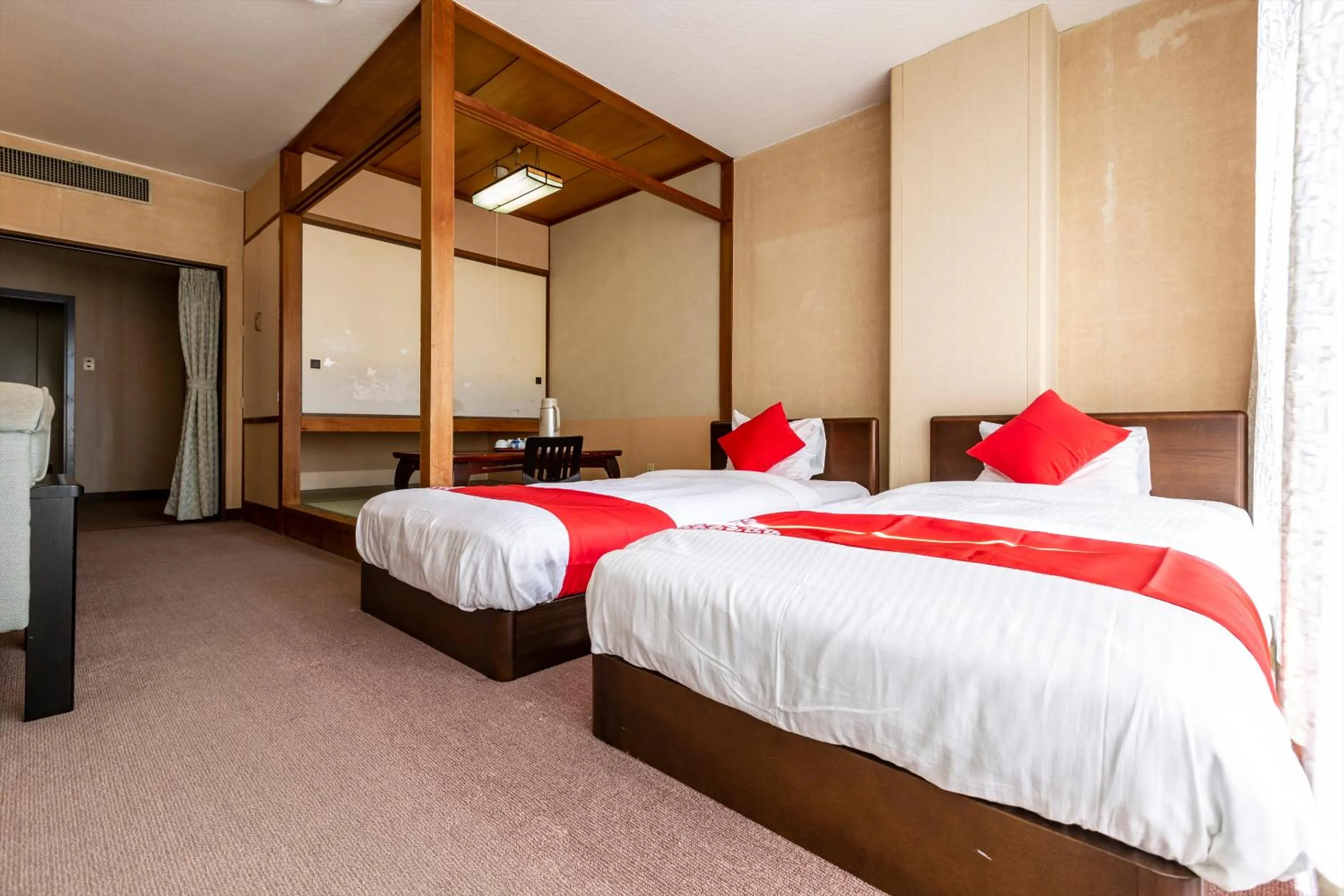 Bedroom, Bed in Tsuruga Tunnel Onsen Kitaguni Grand Hotel