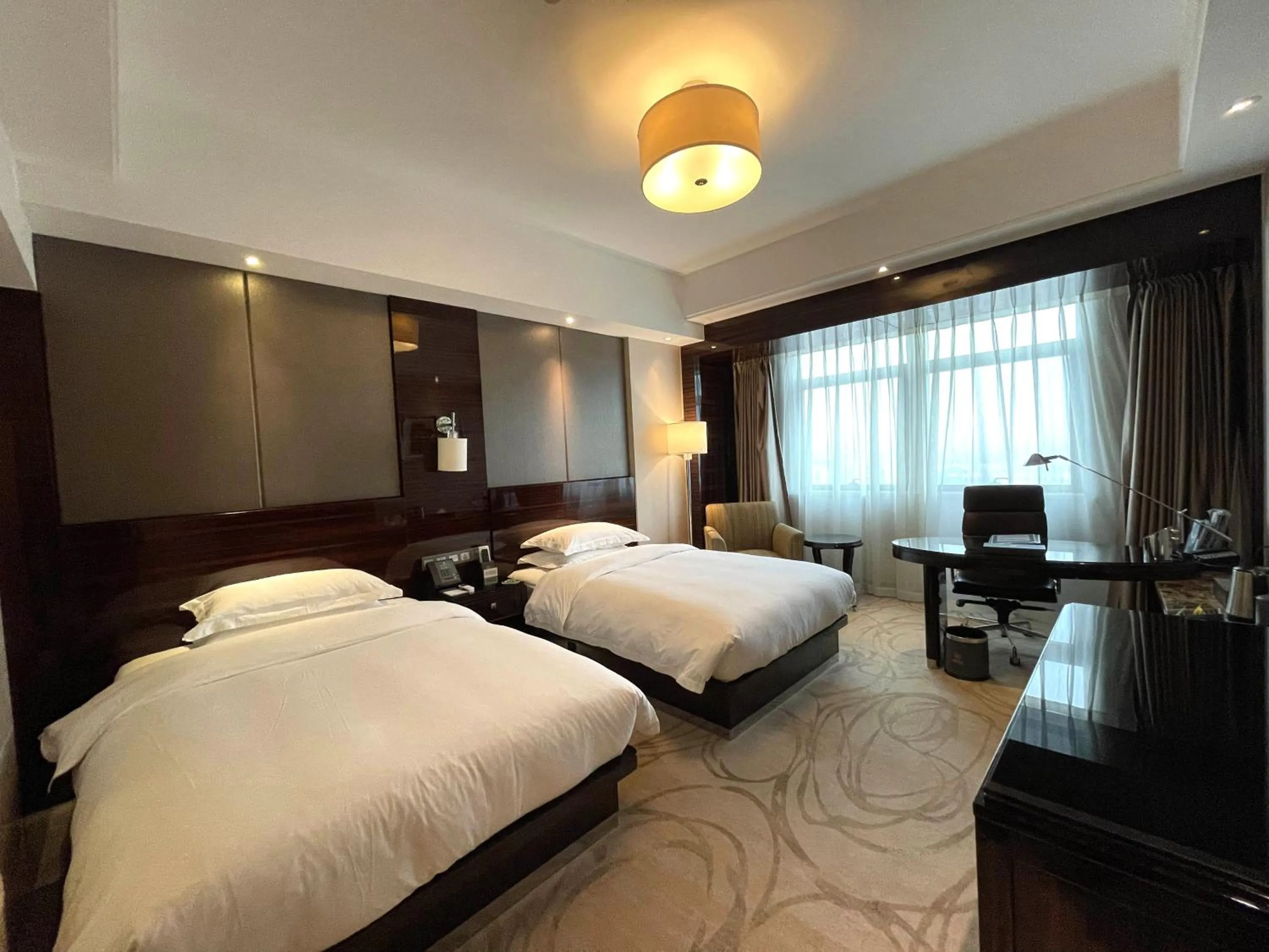 Bed in Lv Shou Hotel