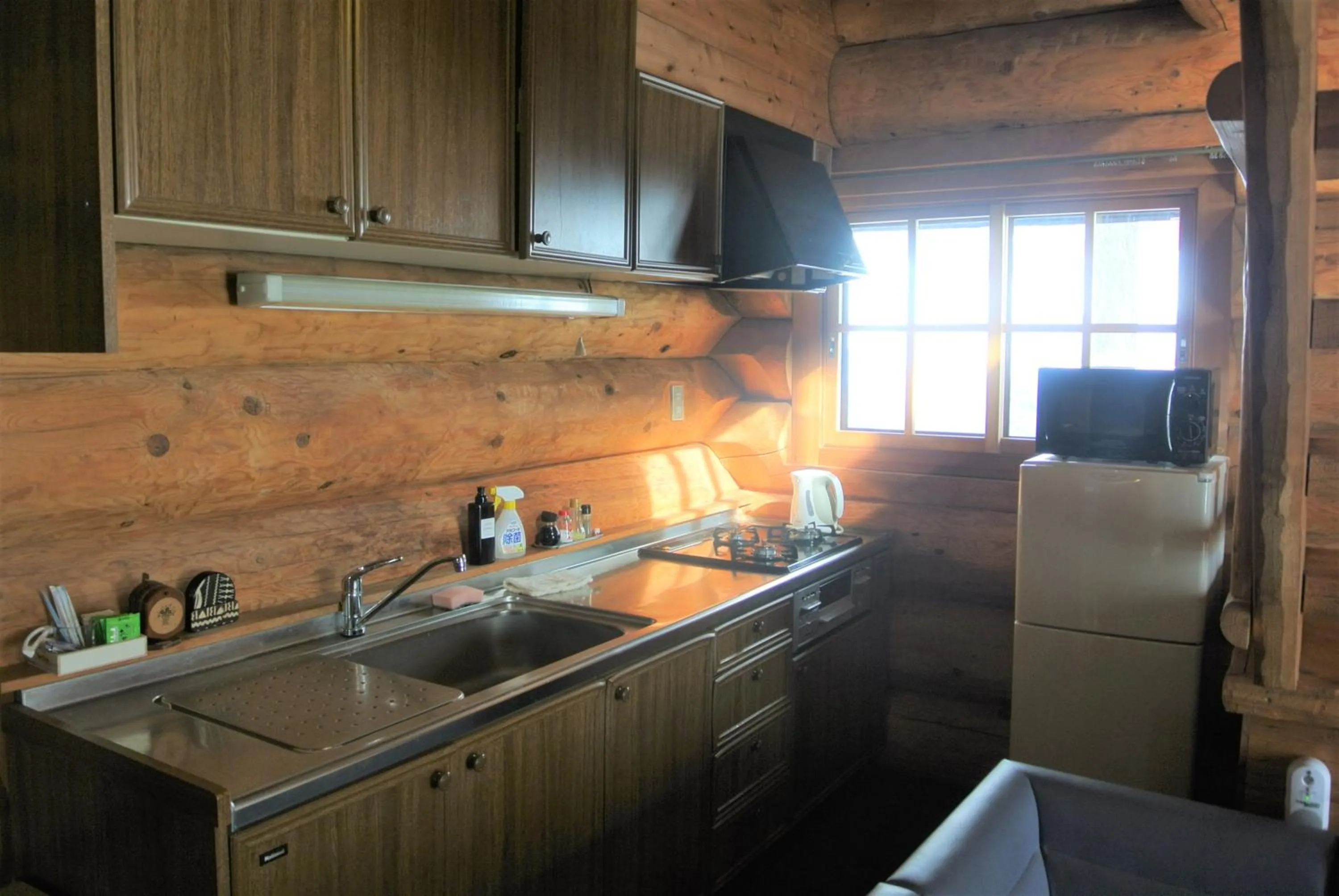 Kitchen or kitchenette in White Tree Log House Madarao Tangram