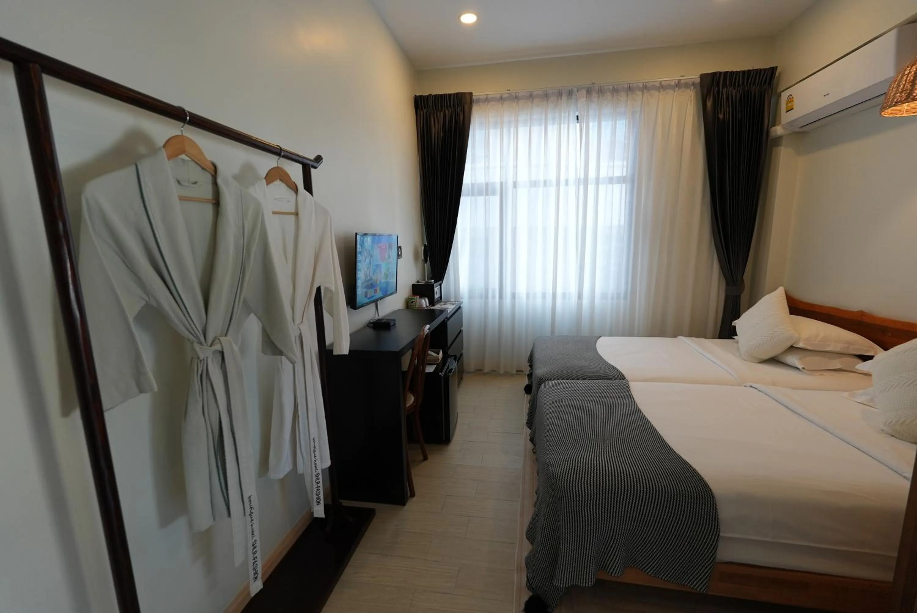 Bed in YOLO Bangkok Boutique Hotel