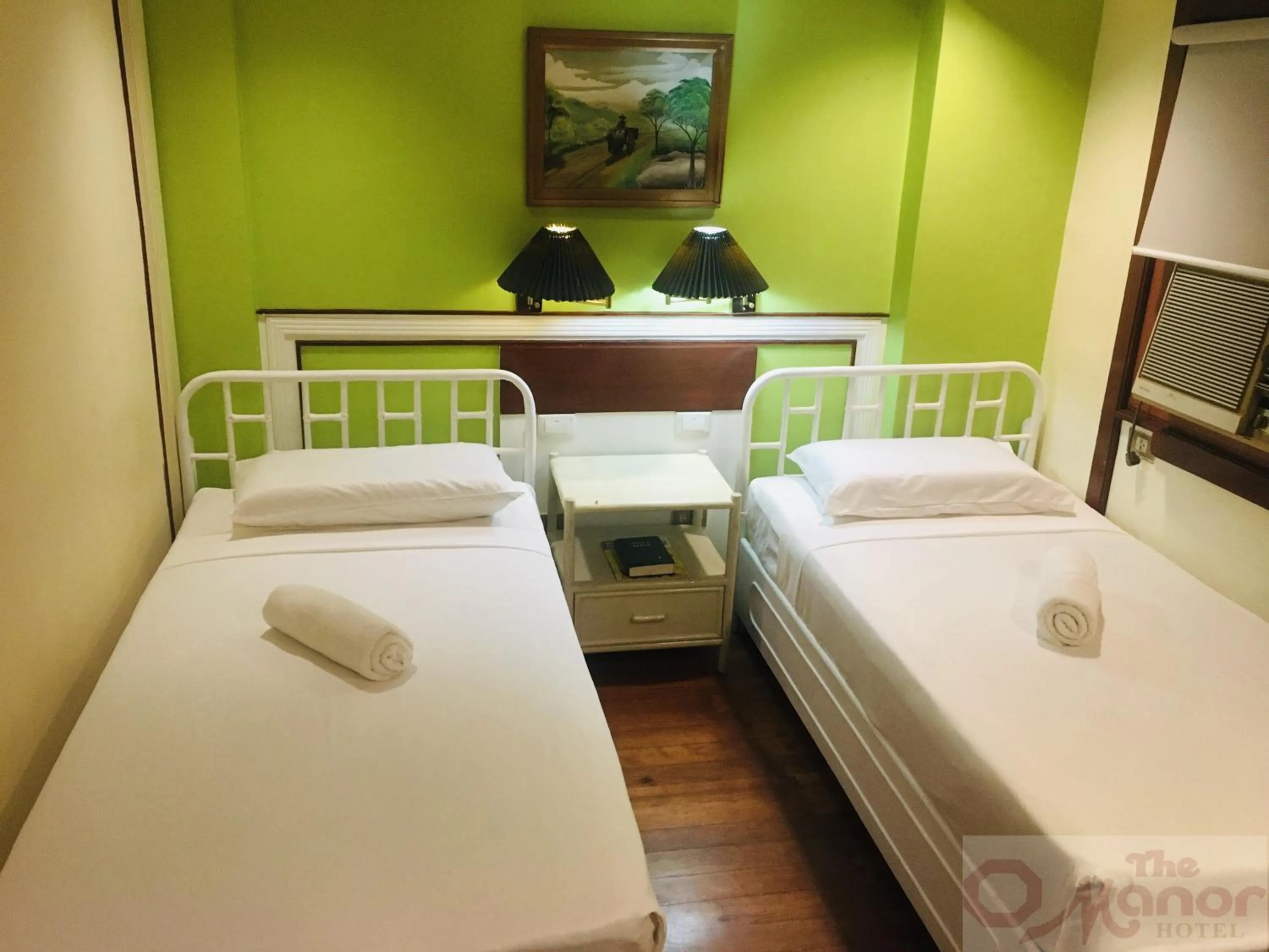 Bed in The Manor Hotel