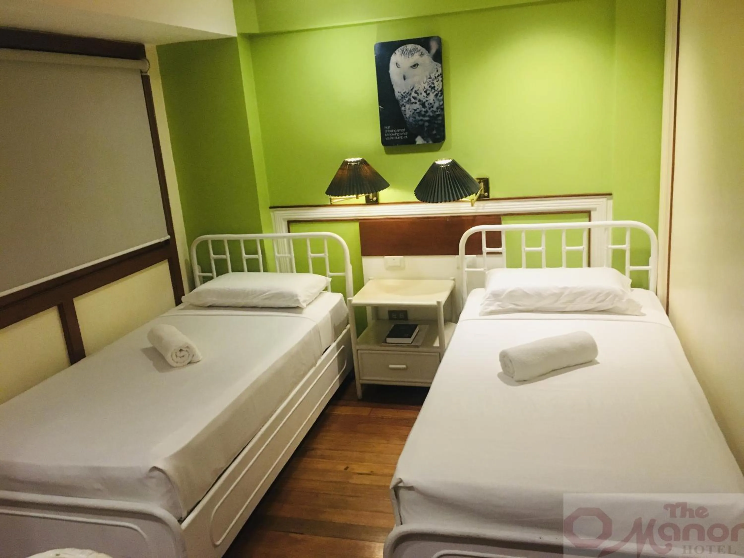 Bed in The Manor Hotel