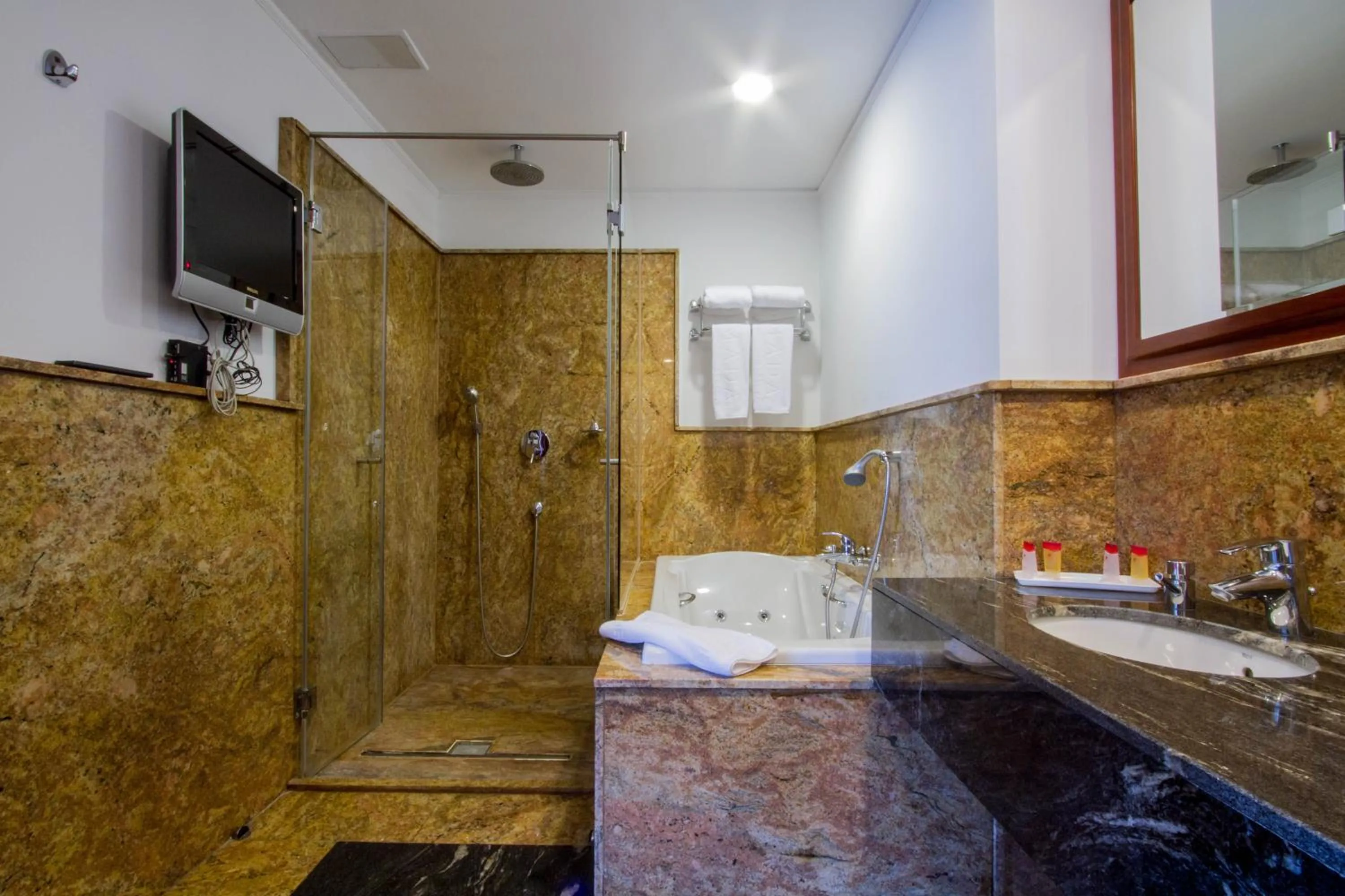 Photo of the whole room, Bathroom in Ramada by Wyndham Brasov