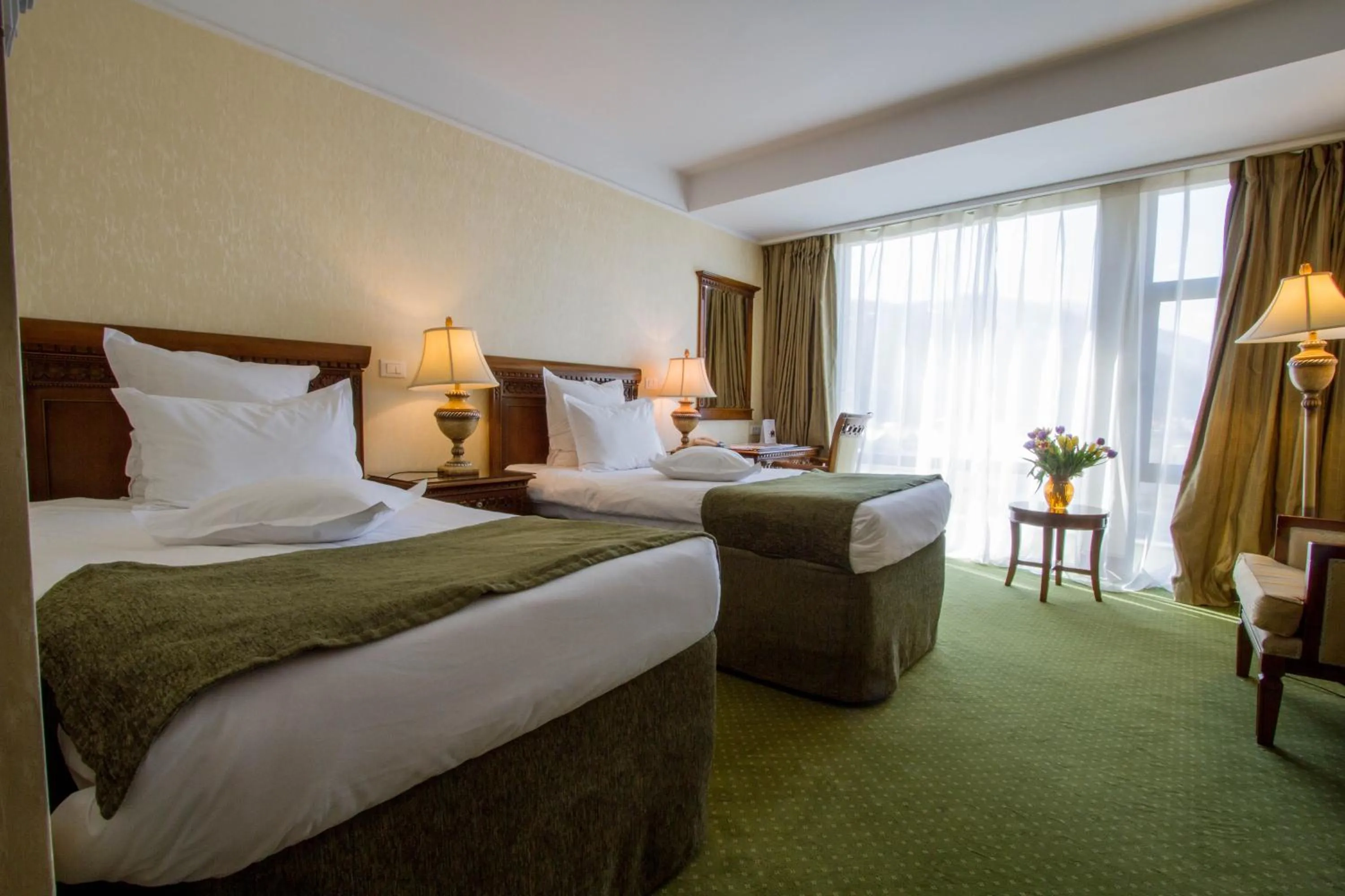 Photo of the whole room, Bed in Ramada by Wyndham Brasov