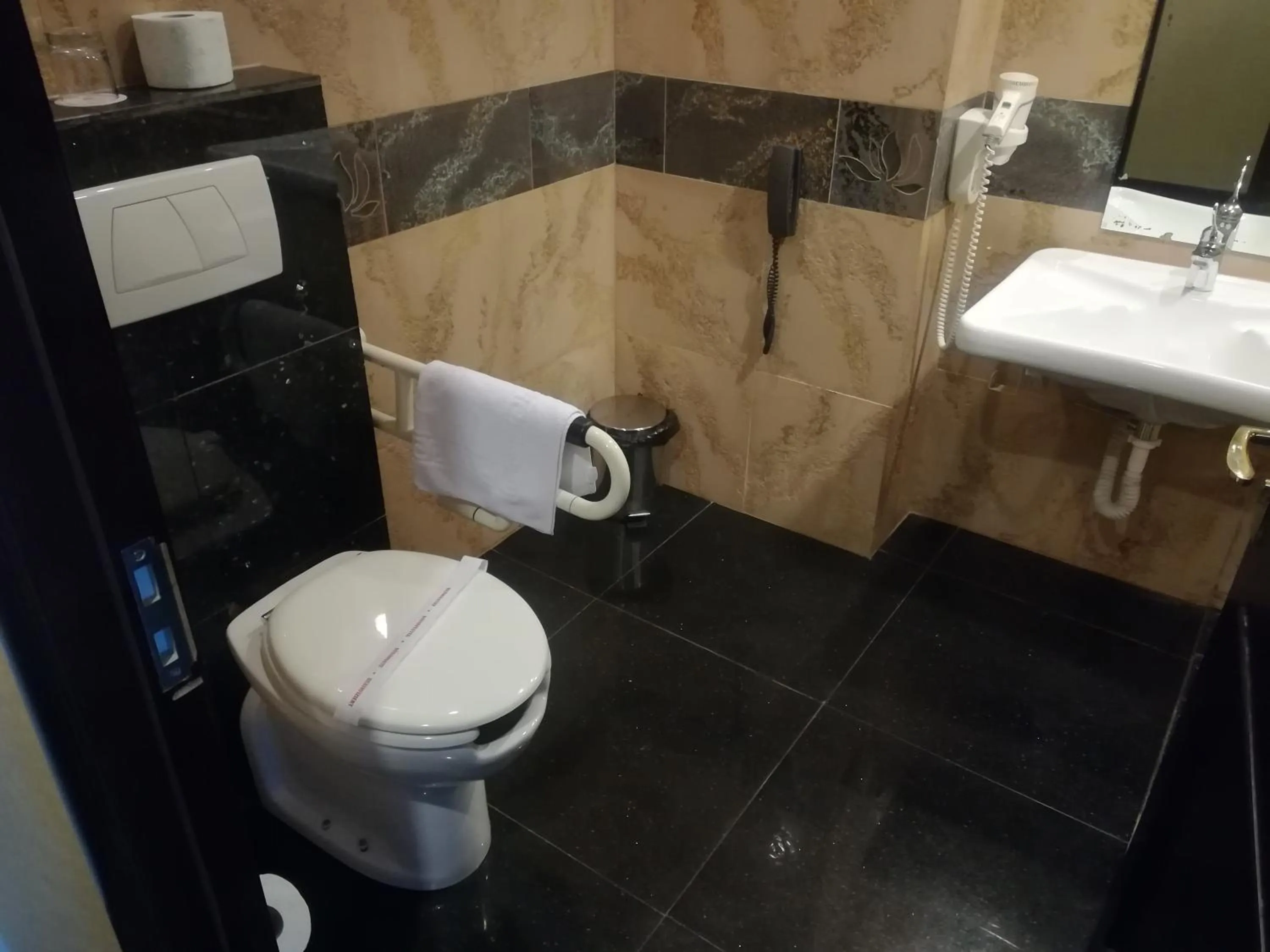 Bathroom in Ramada by Wyndham Brasov