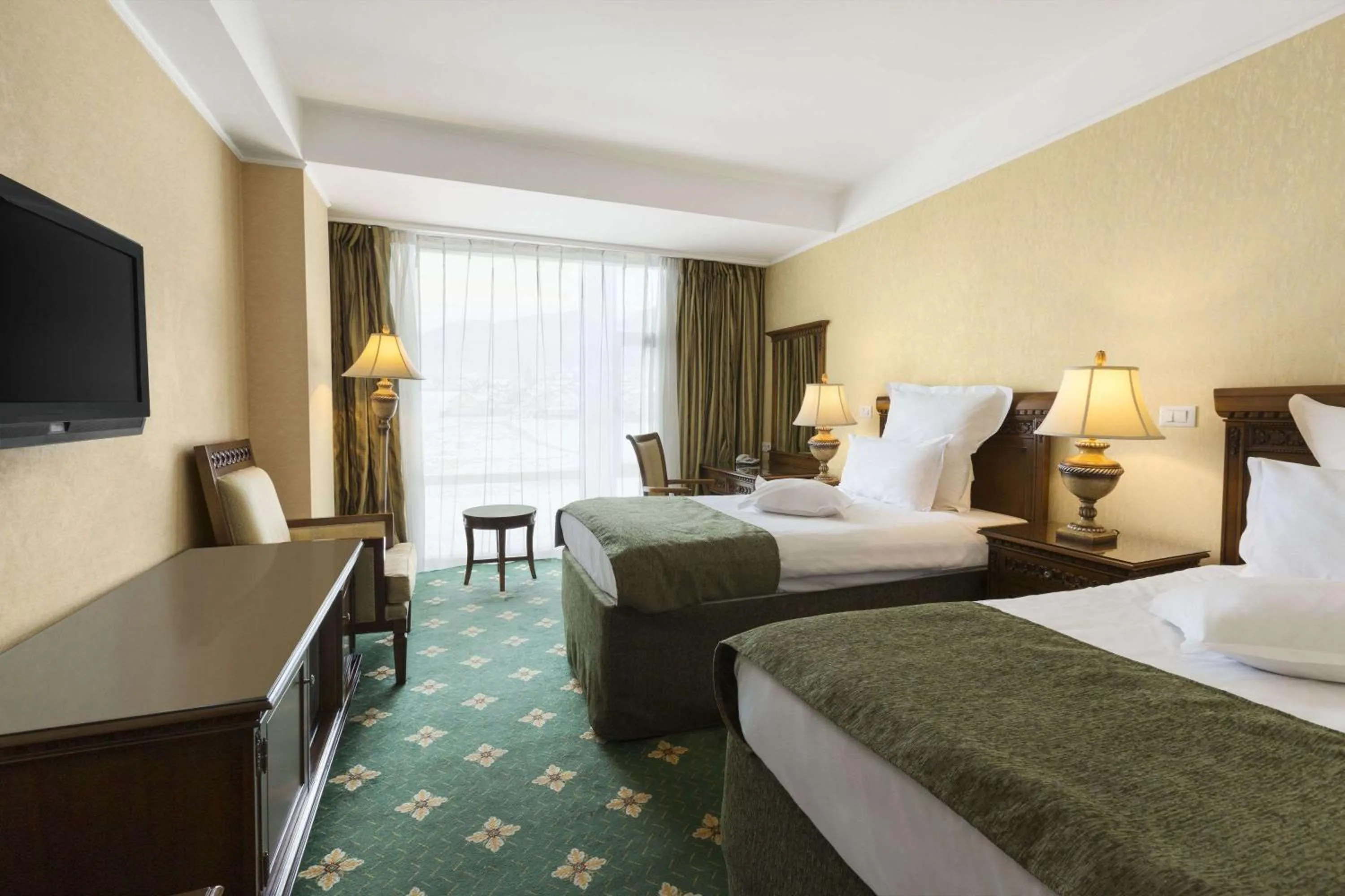 Photo of the whole room, Bed in Ramada by Wyndham Brasov