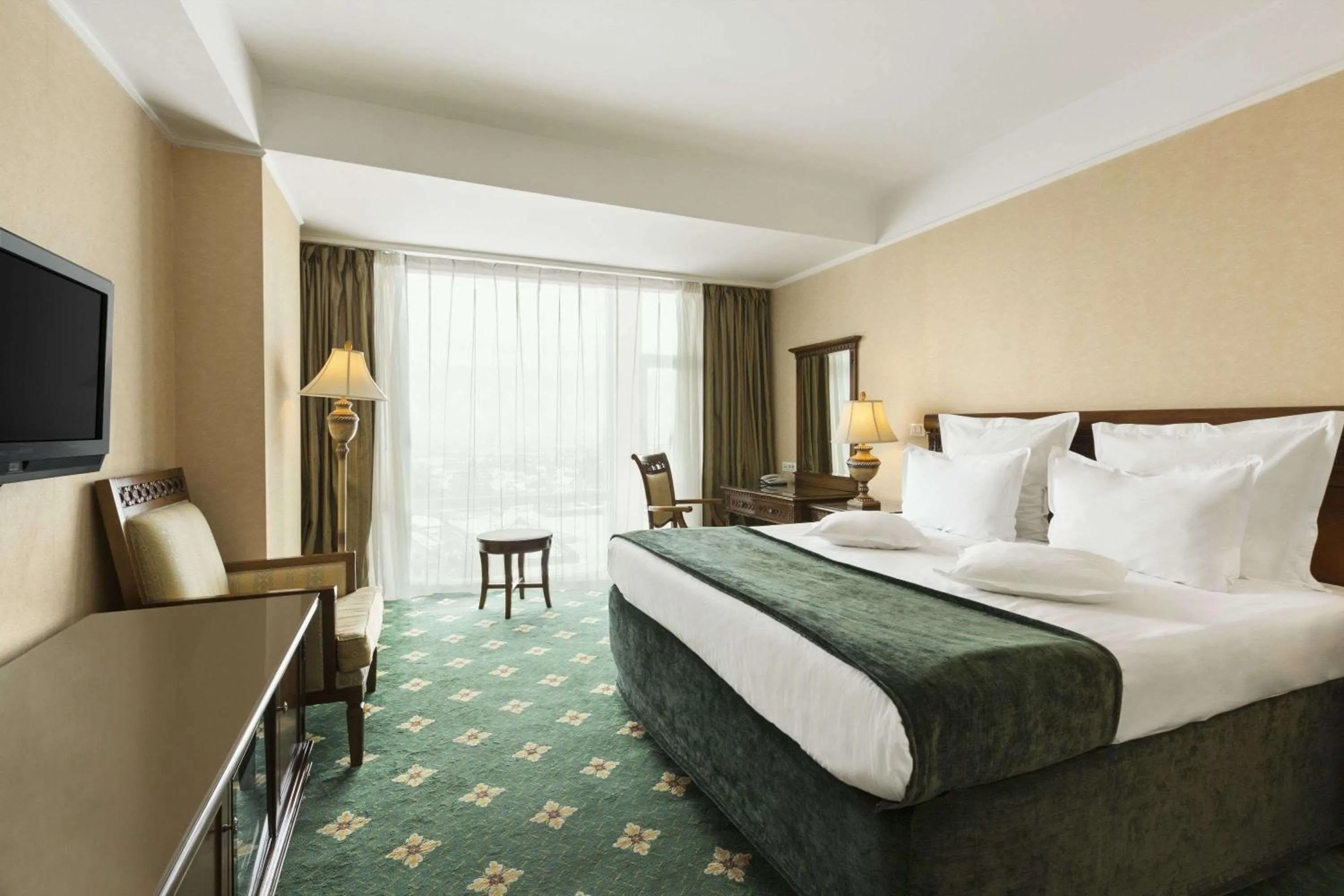 Photo of the whole room, Bed in Ramada by Wyndham Brasov