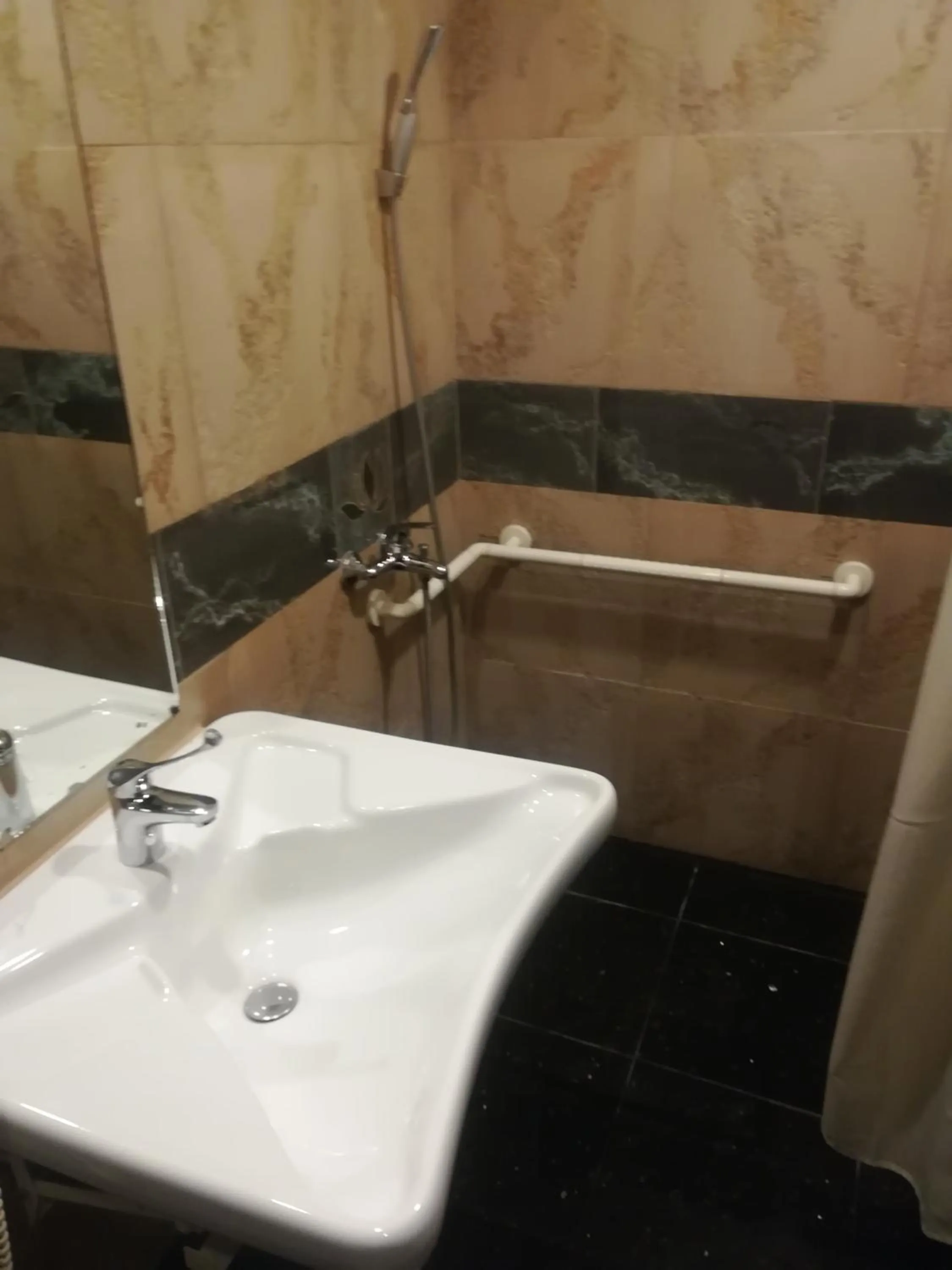 Bathroom in Ramada by Wyndham Brasov