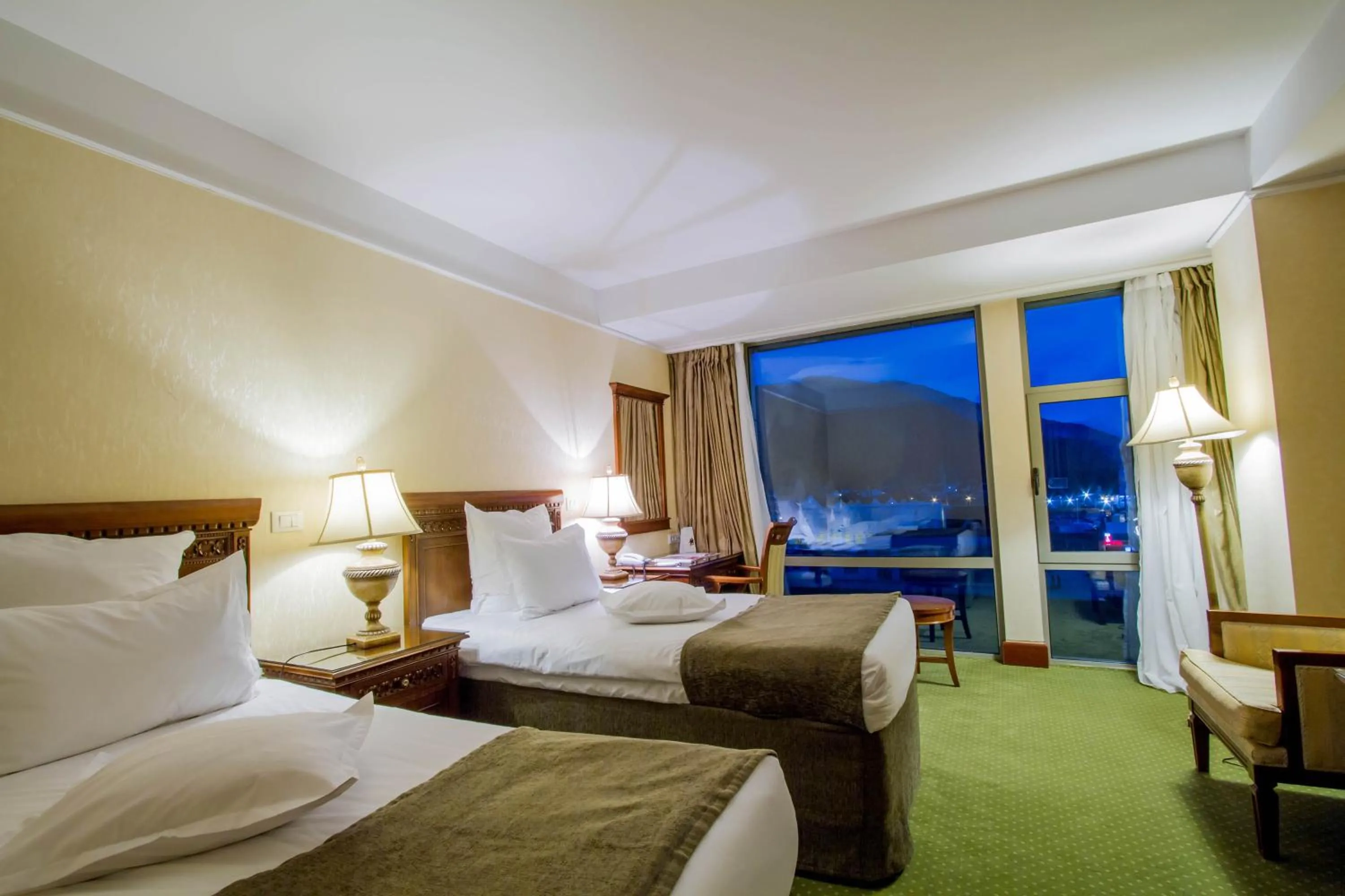 Photo of the whole room, Bed in Ramada by Wyndham Brasov