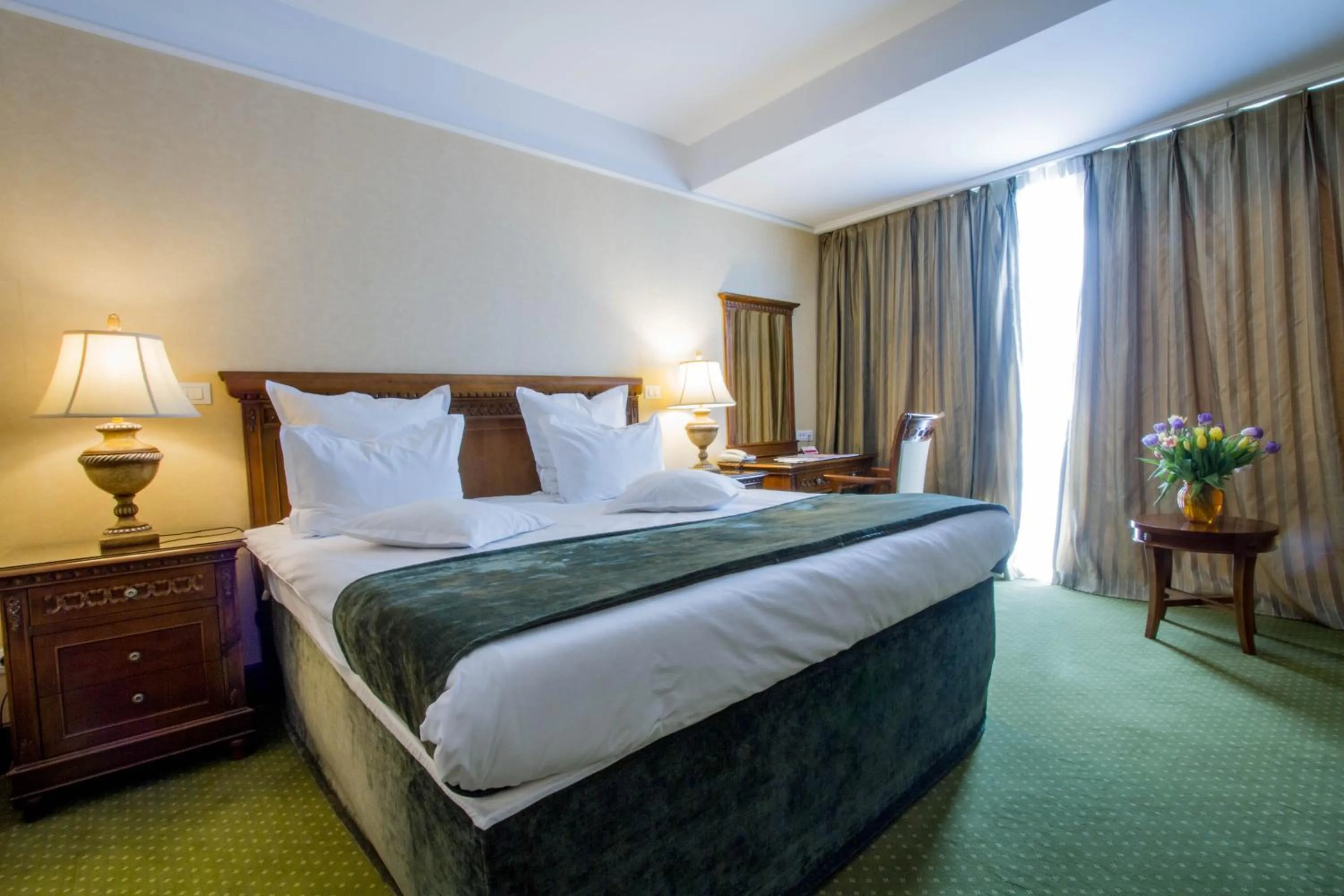 Decorative detail, Bed in Ramada by Wyndham Brasov