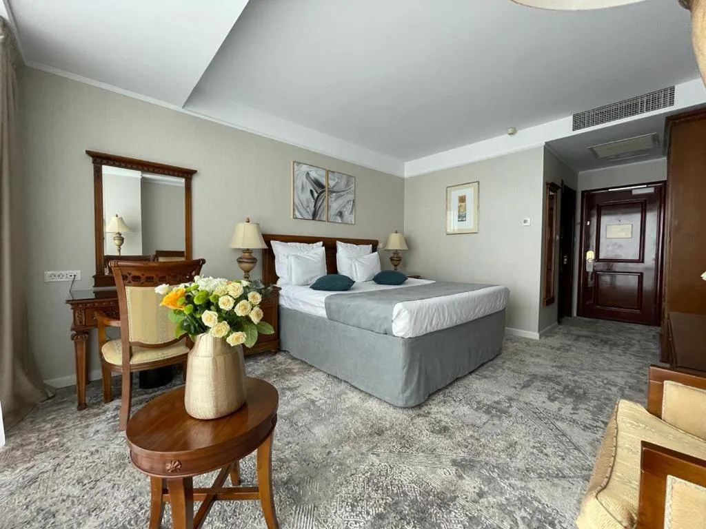 Bed in Ramada by Wyndham Brasov