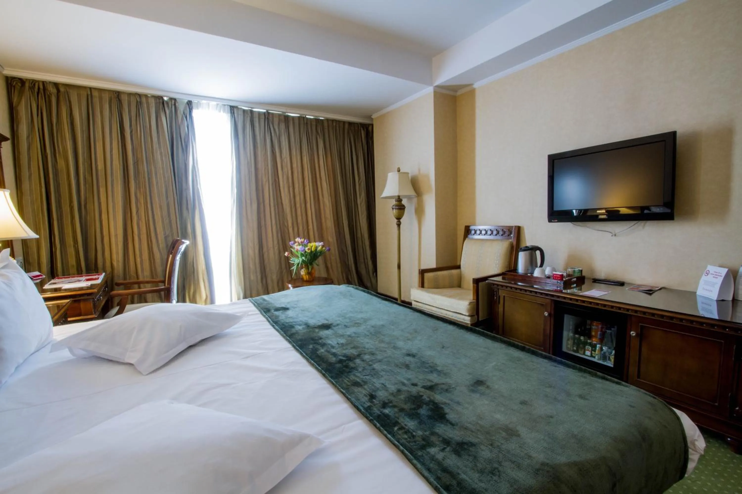 Photo of the whole room, Bed in Ramada by Wyndham Brasov