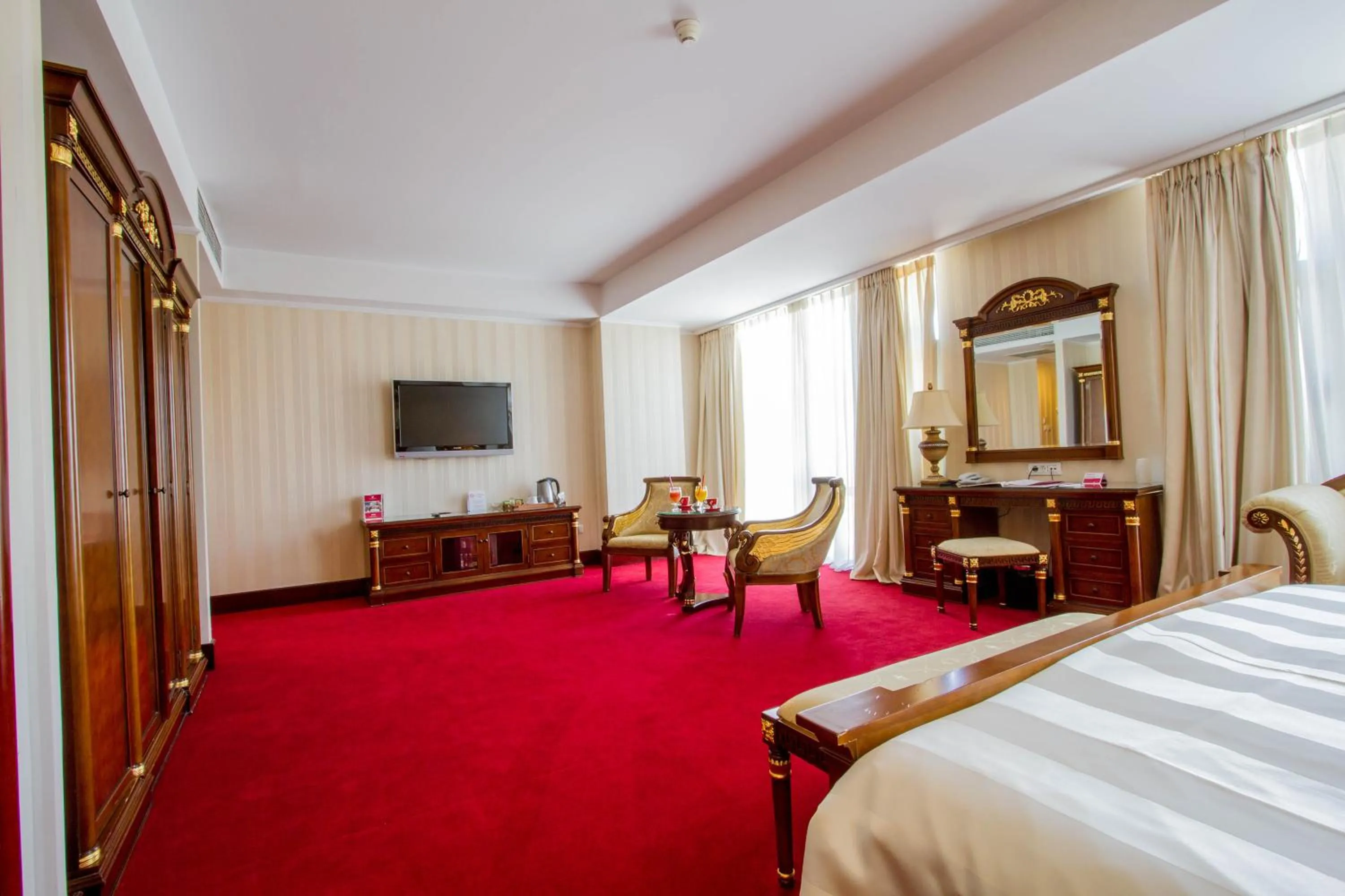 Photo of the whole room, Bed in Ramada by Wyndham Brasov