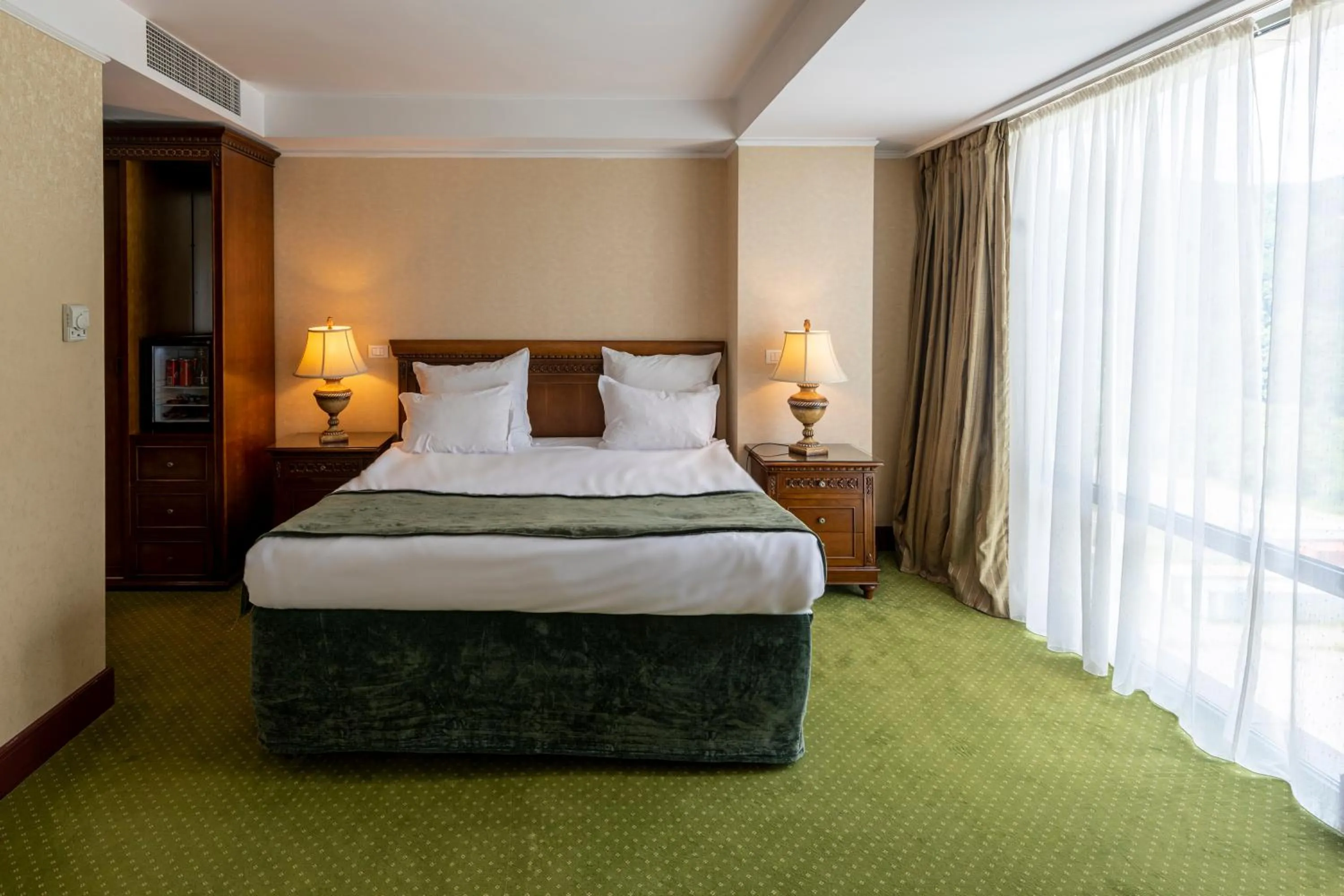 Bed in Ramada by Wyndham Brasov