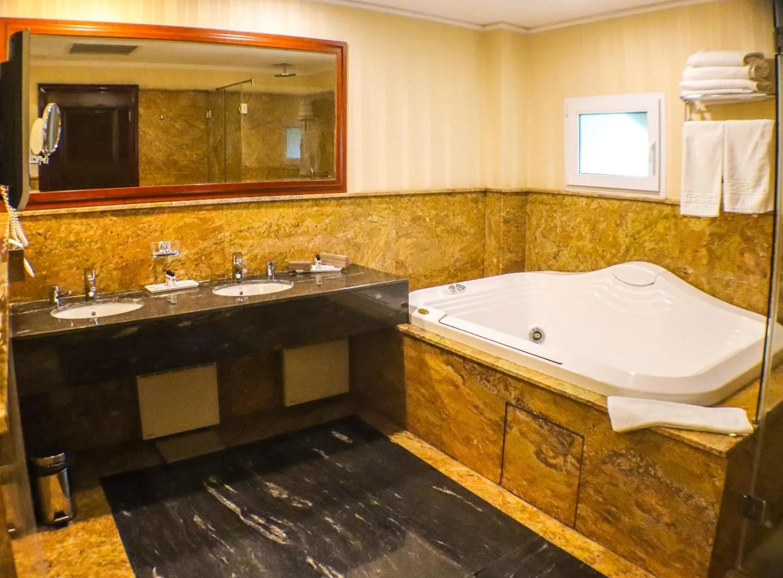 Bathroom in Ramada by Wyndham Brasov