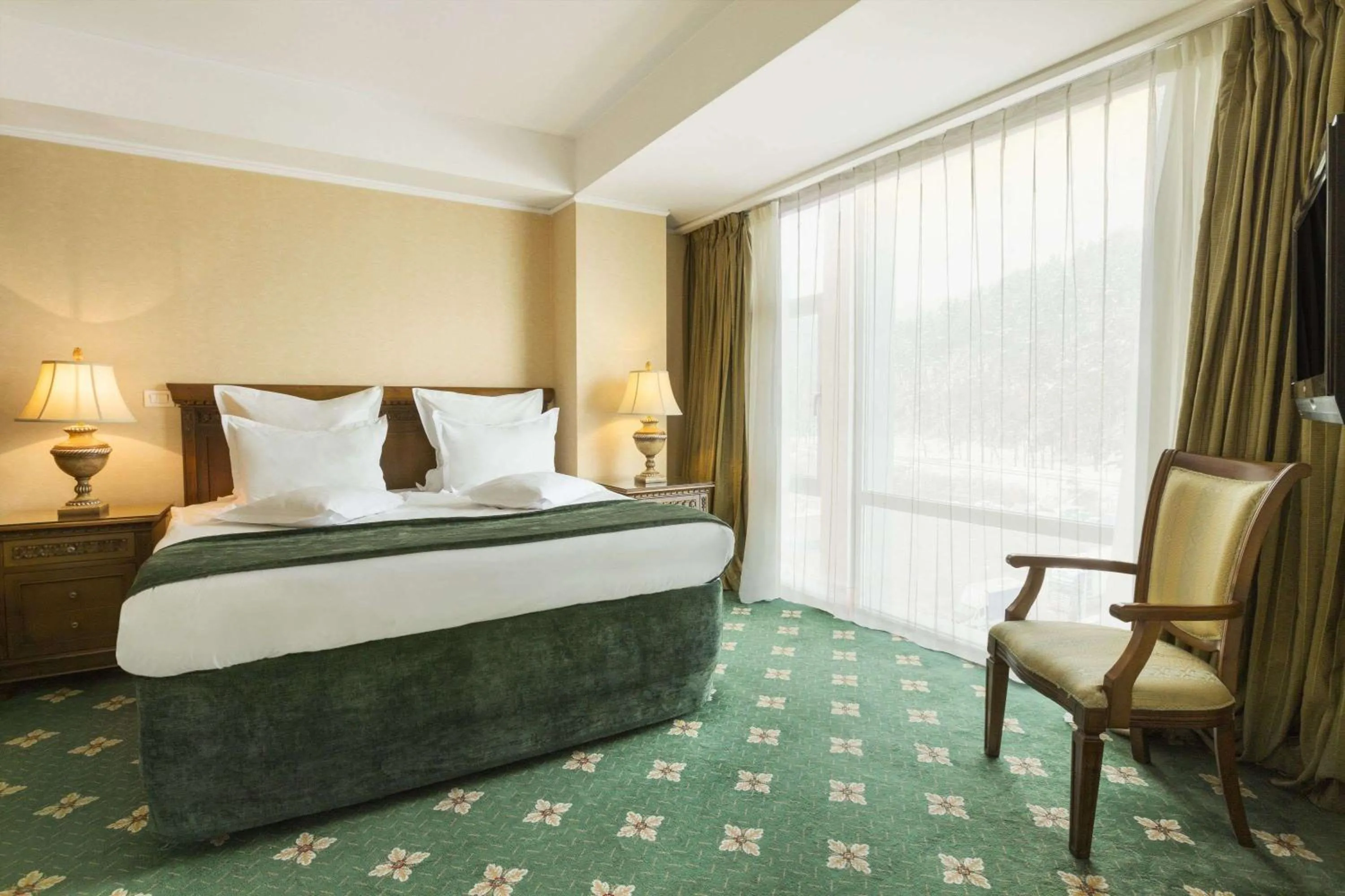 Photo of the whole room, Bed in Ramada by Wyndham Brasov