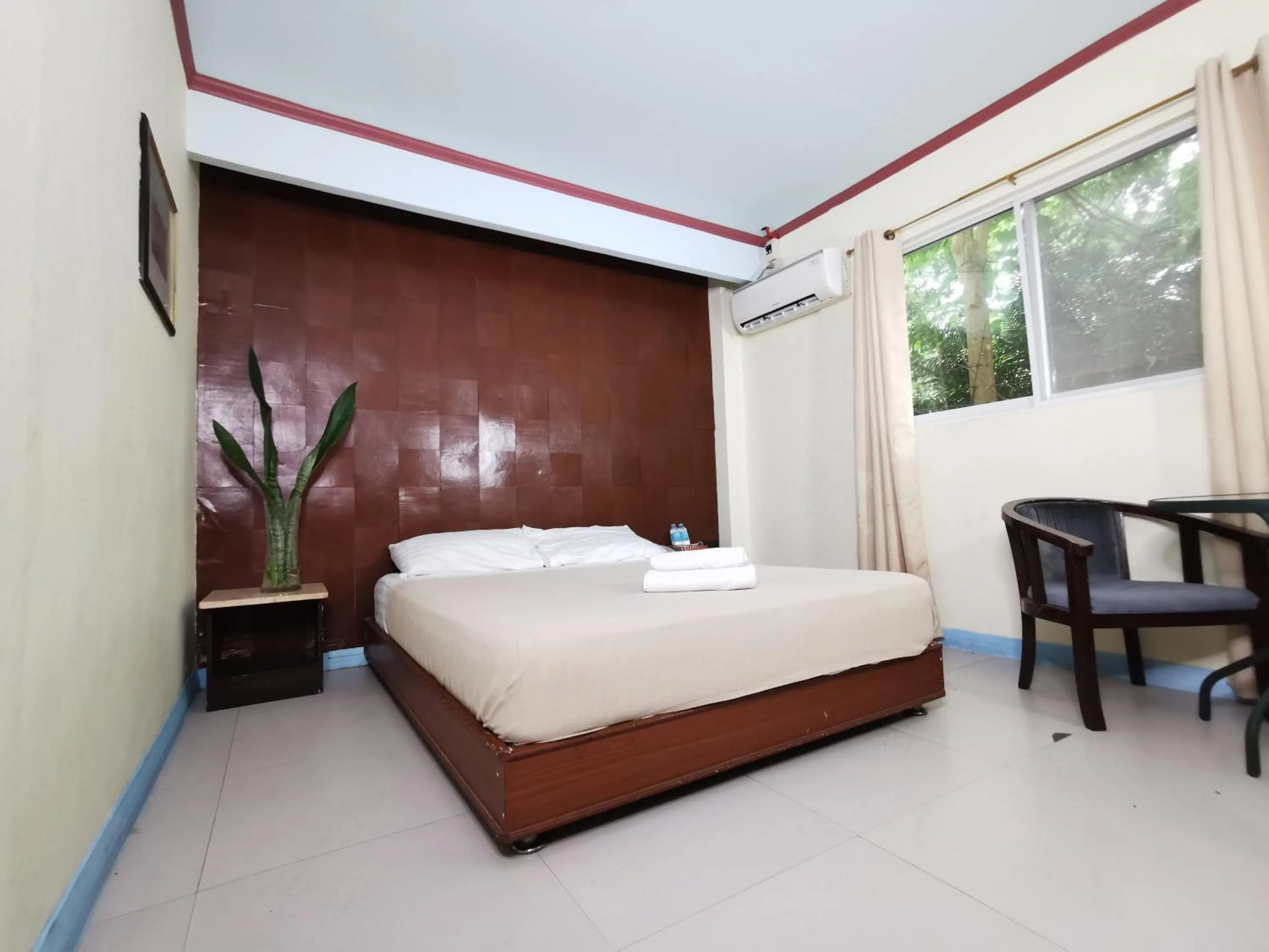Bed in Cebu Hilltop Hotel