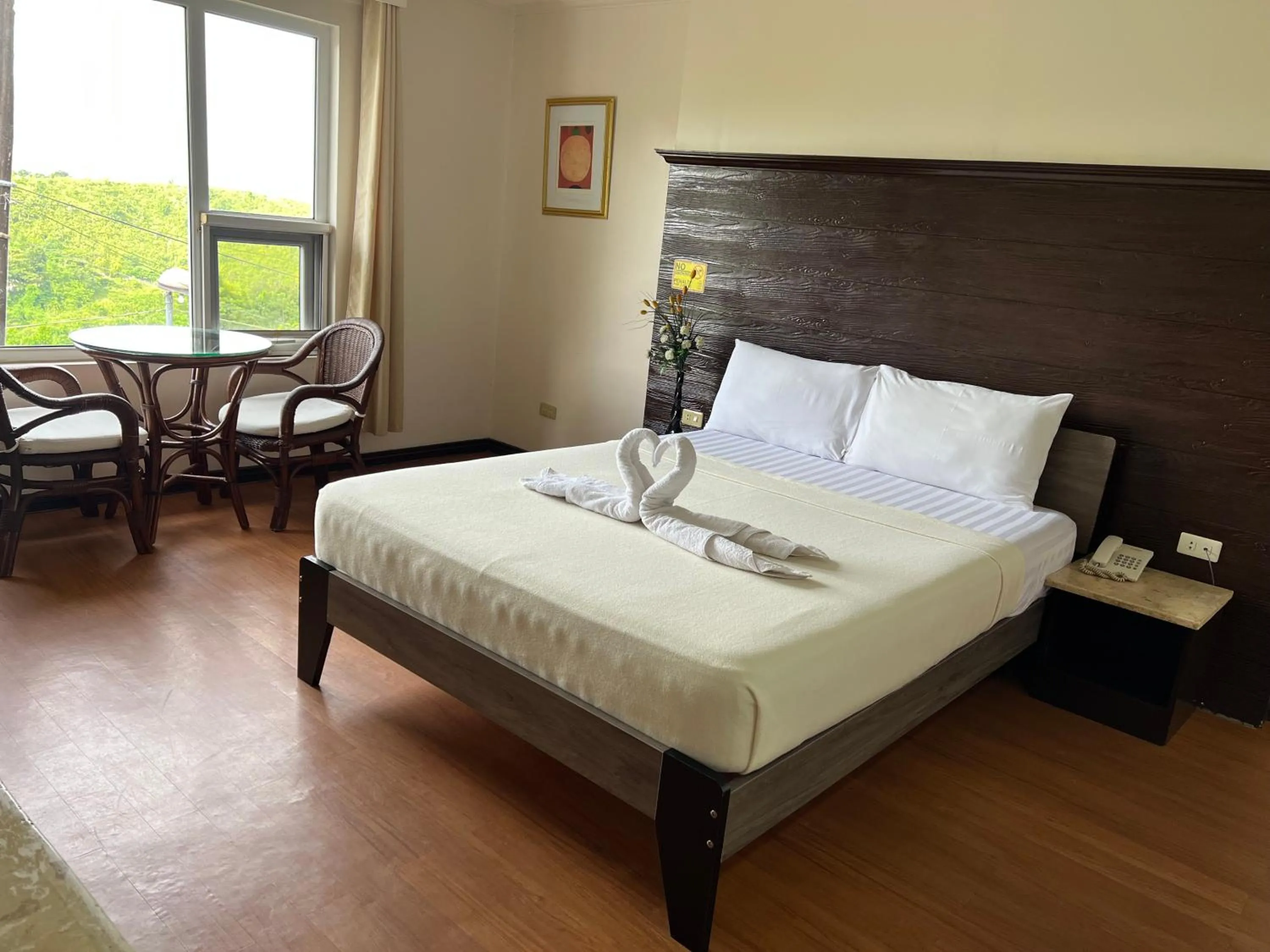 Bed in Cebu Hilltop Hotel